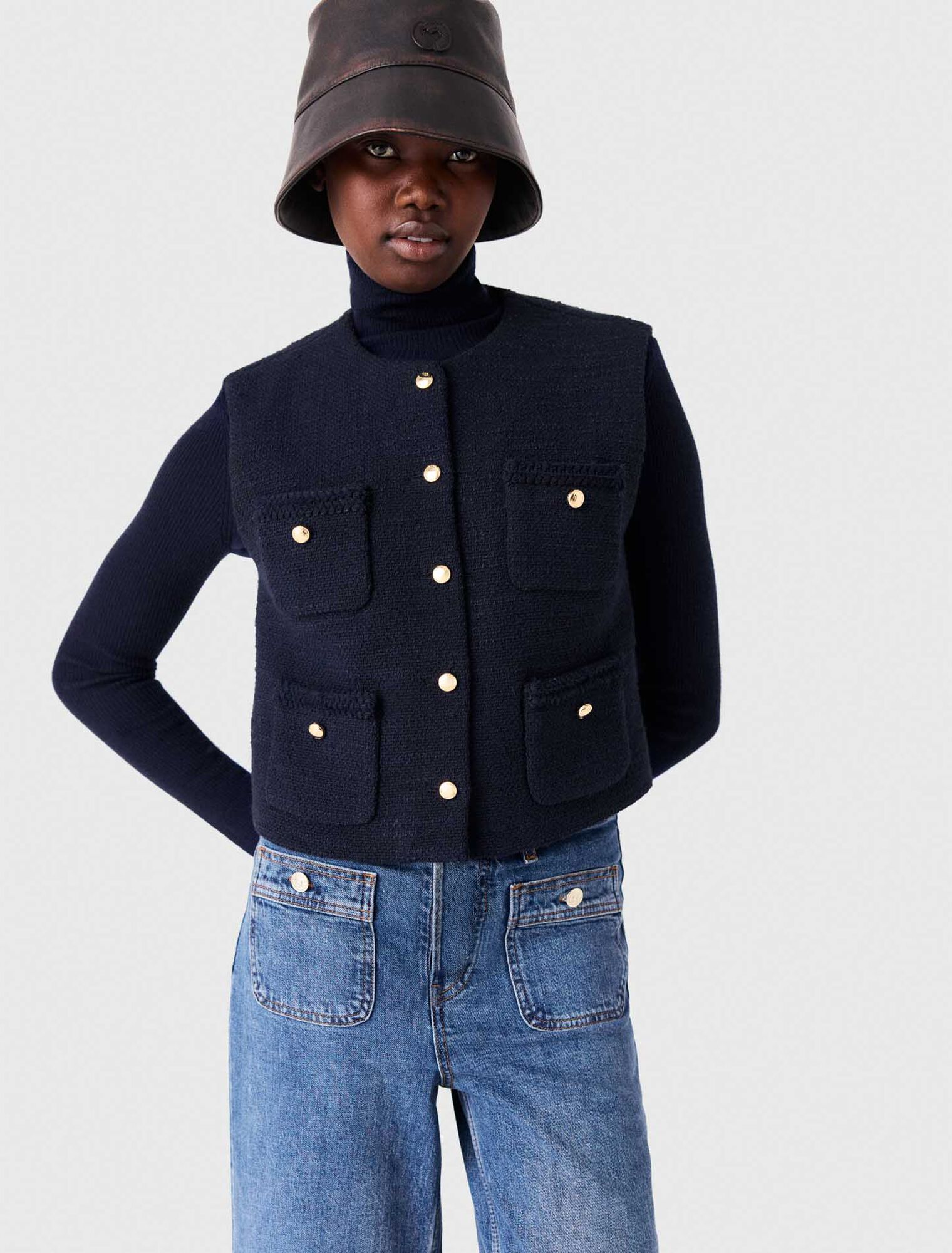 Sleeveless tweed jacket