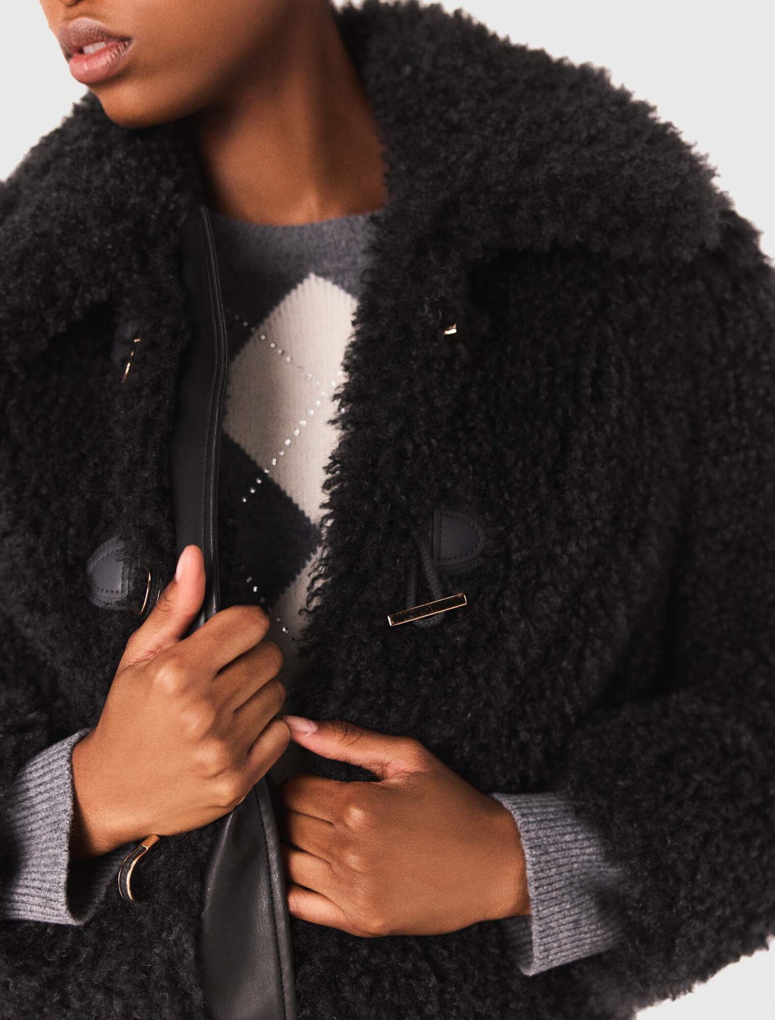 Manteau court en bouclette