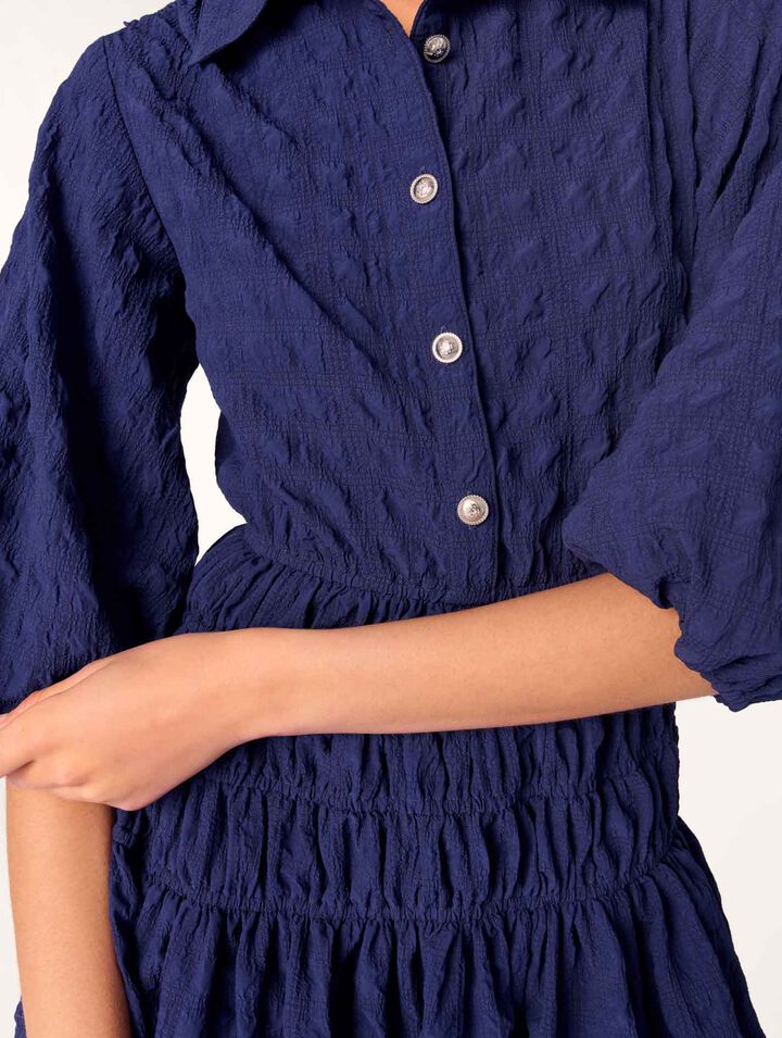 Short satin-effect pleated dress