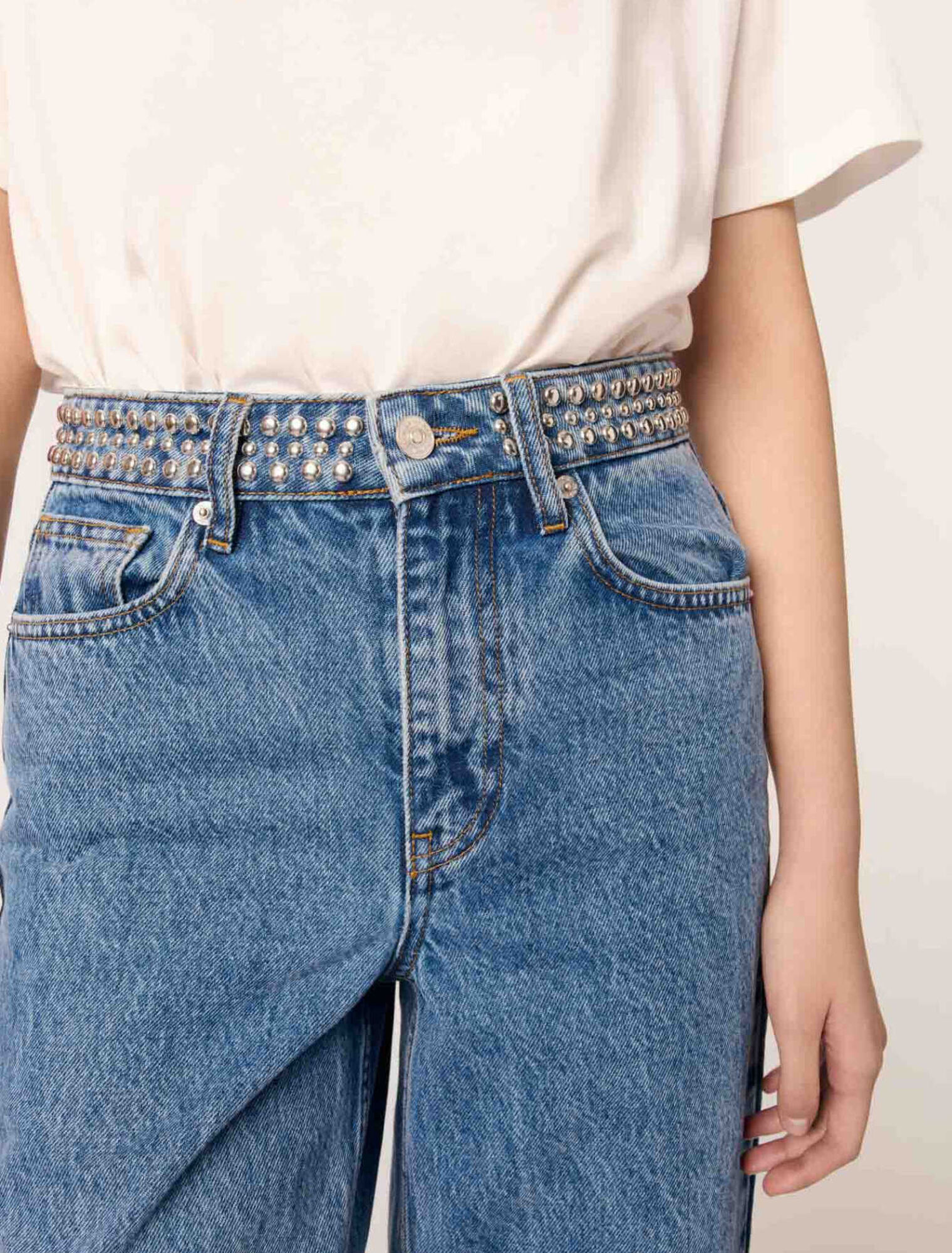 Jean flare &agrave; ceinture stud&eacute;e
