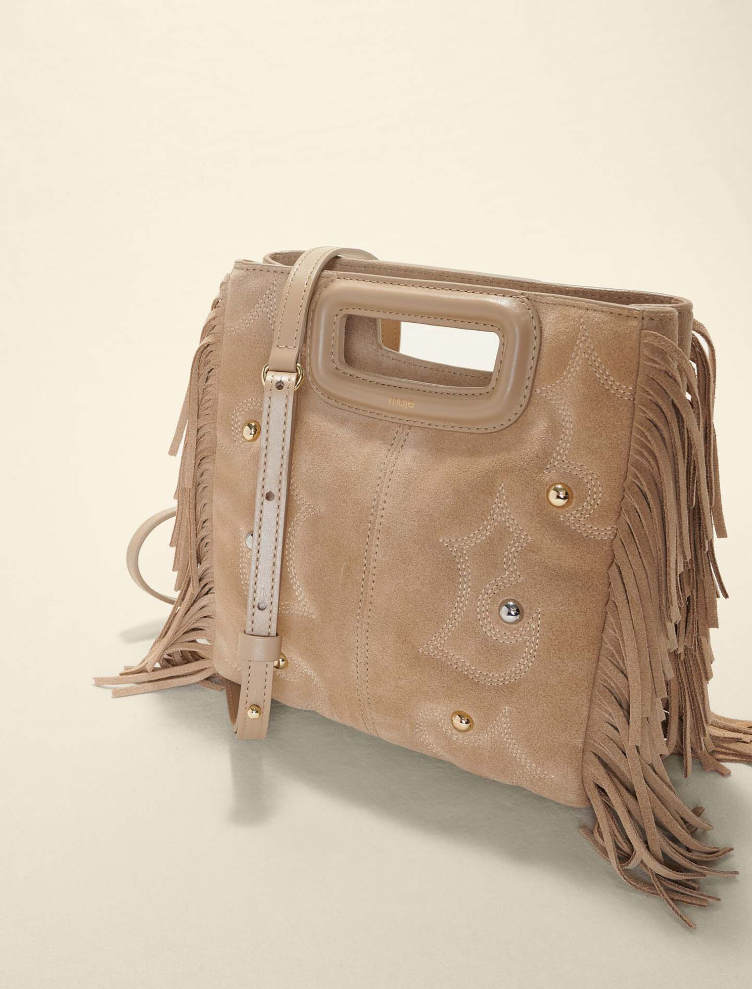 Embroidered studded leather M bag