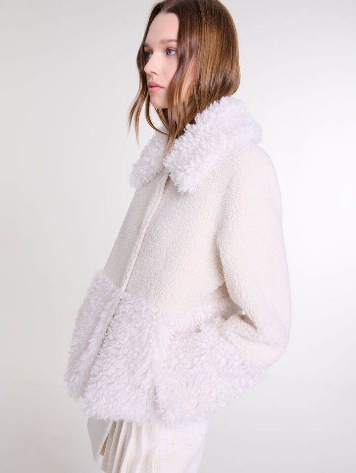 Manteau court fausse fourrure