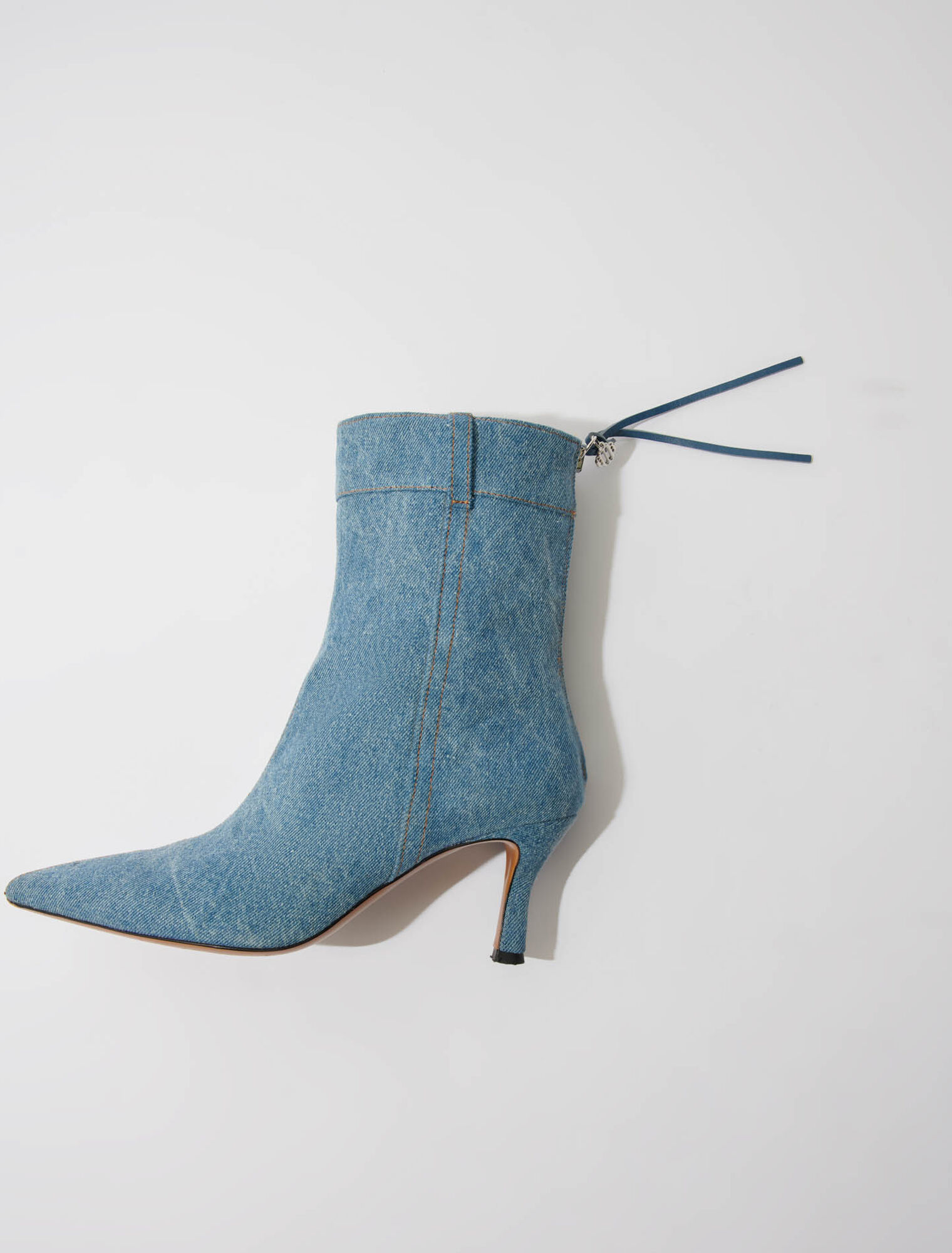 Denim boots with pointed toe