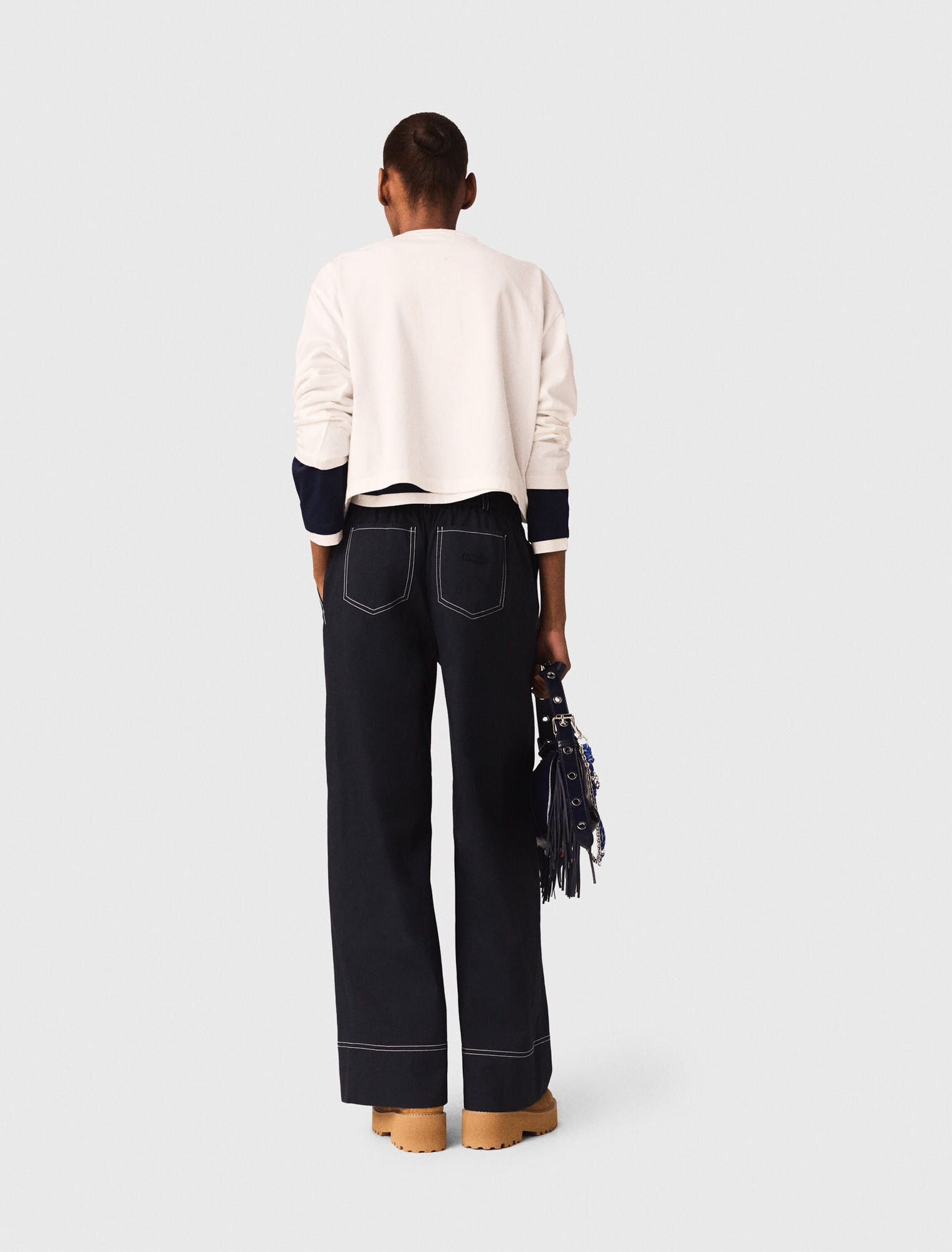 Cotton trousers with leather belt