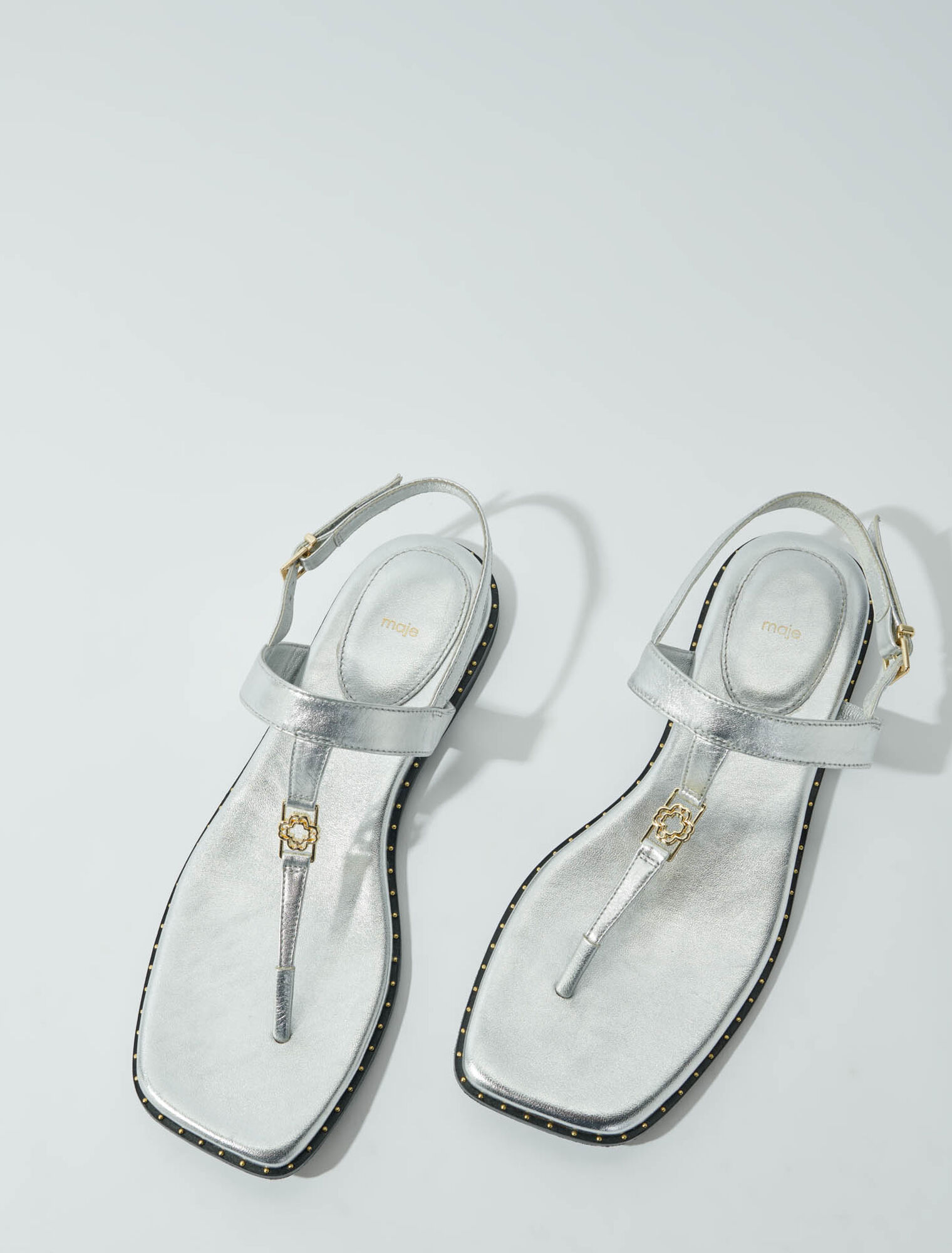 Leather sandals with silver straps