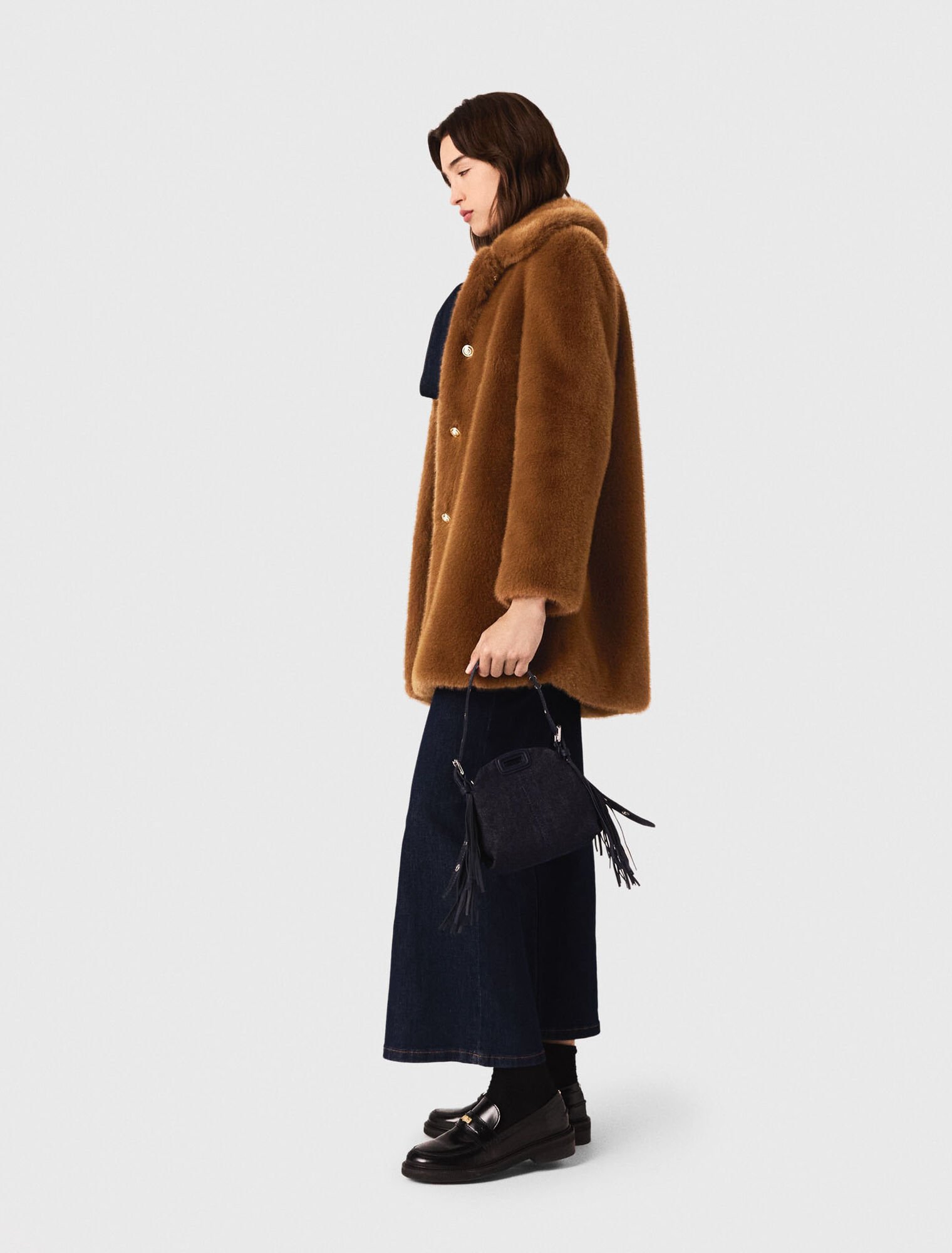 Manteau mi-long en fausse fourrure Manteau mi-long en fausse fourrure