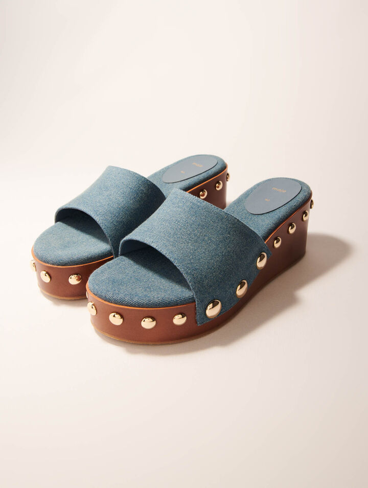 Mules compensées en denim à studs