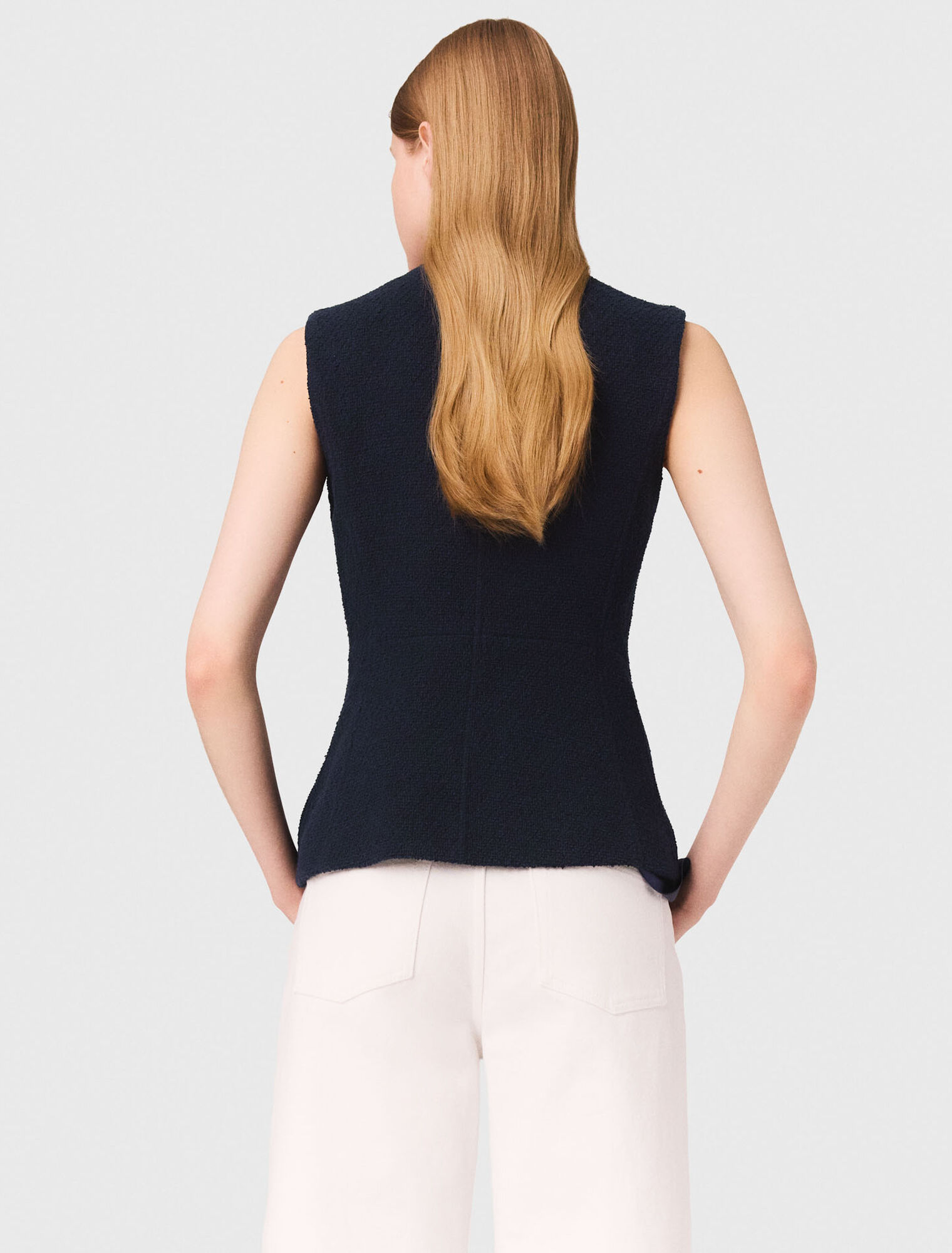 Sleeveless tweed jacket