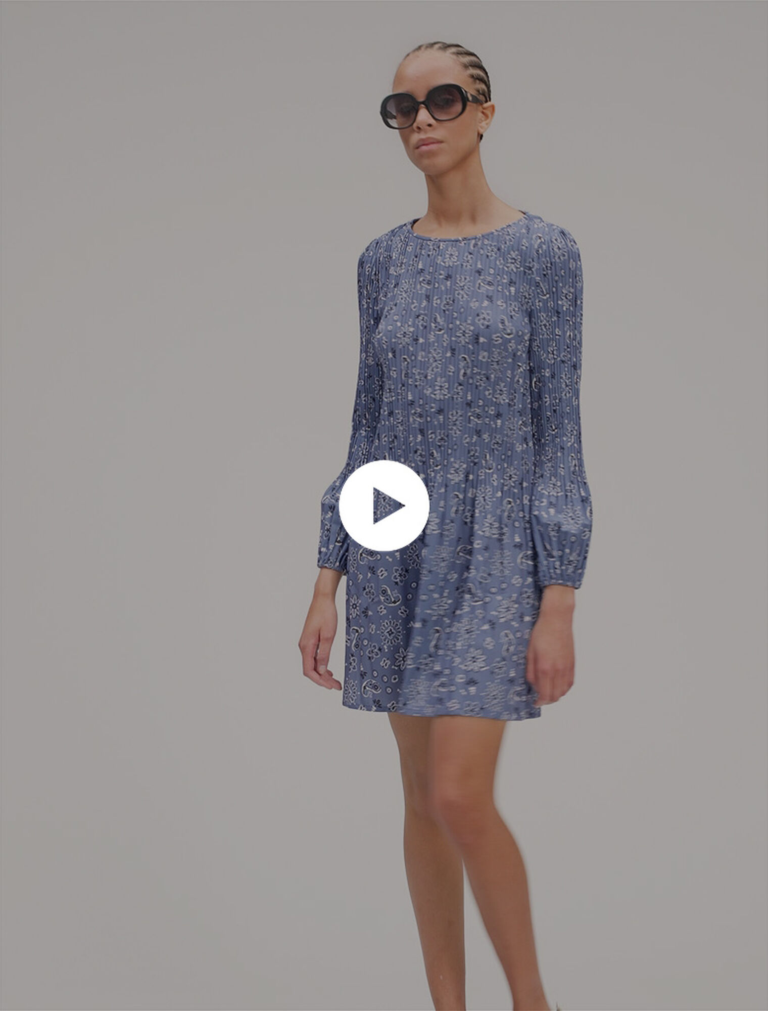 Patterned pleated mini dress
