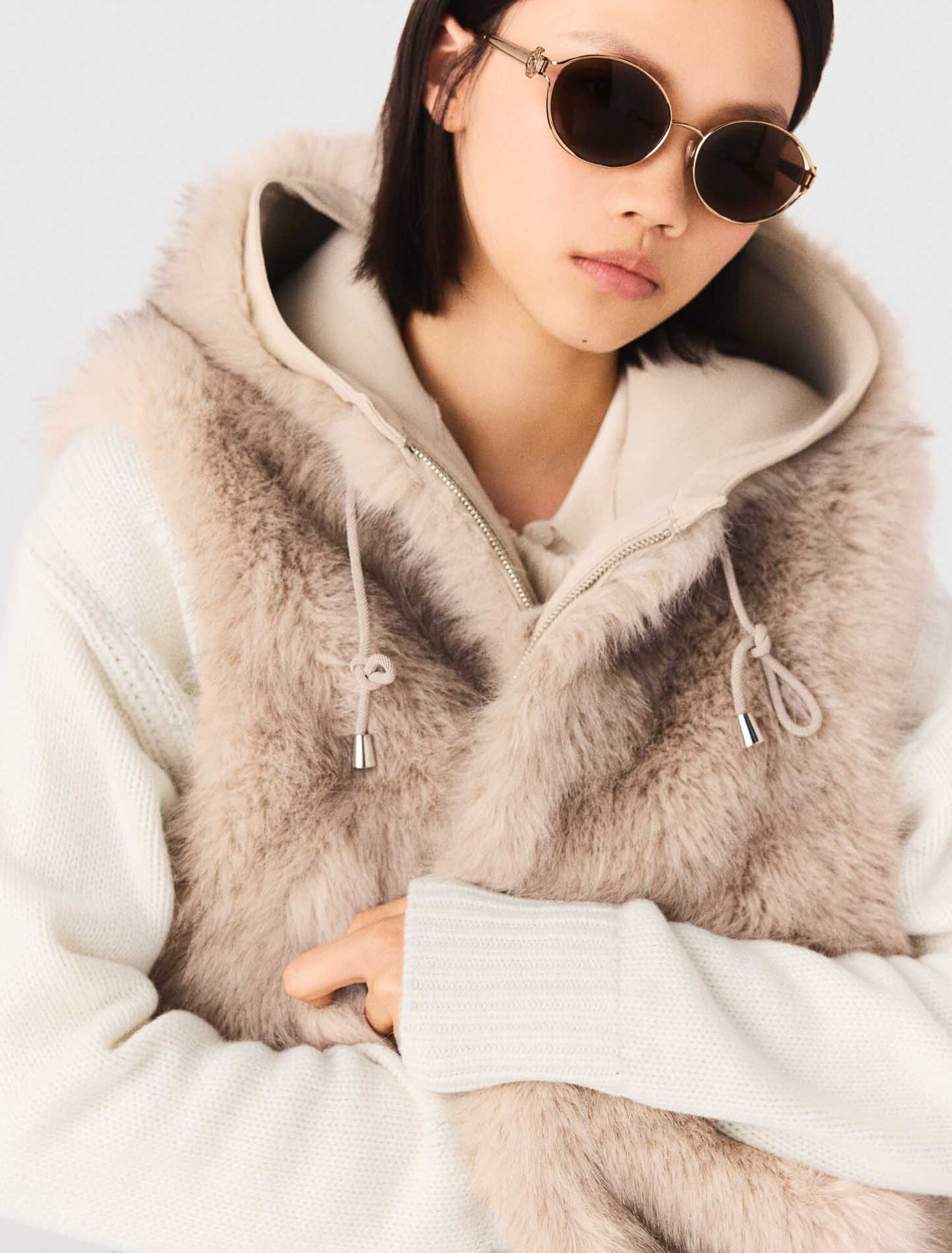 Blouson court en fausse fourrure