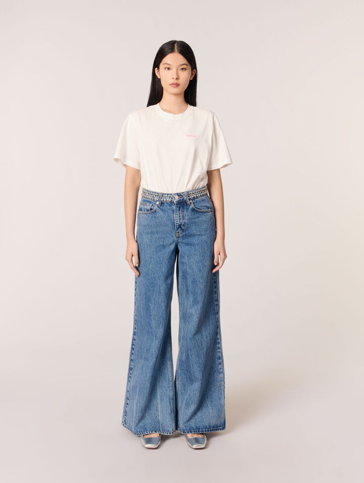 Flared jeans with studded waistband