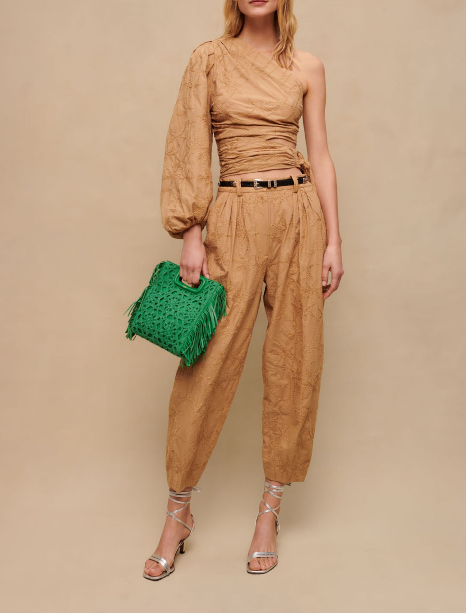 Asymmetric tie top
