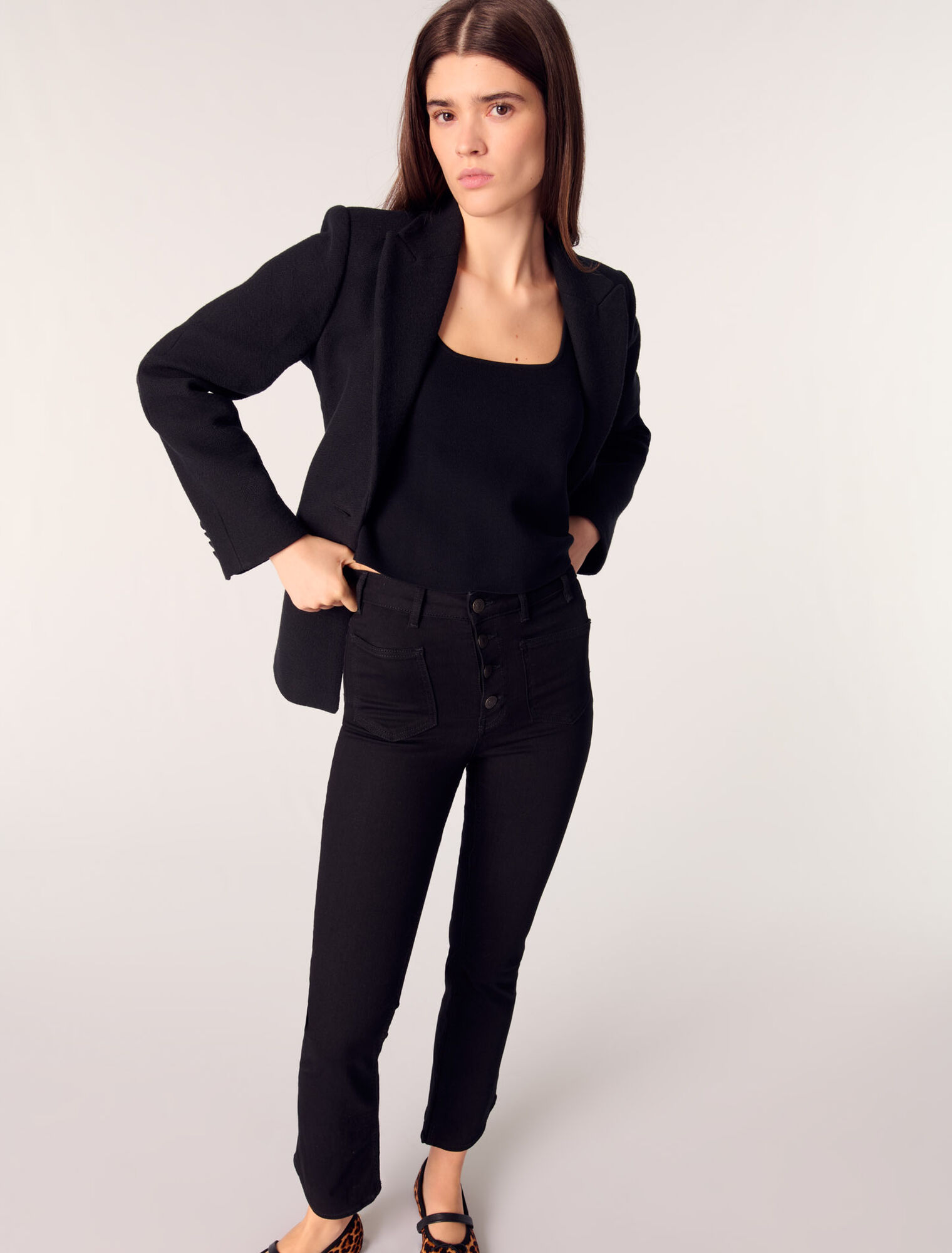 Jeans with pockets, flared at the bottom