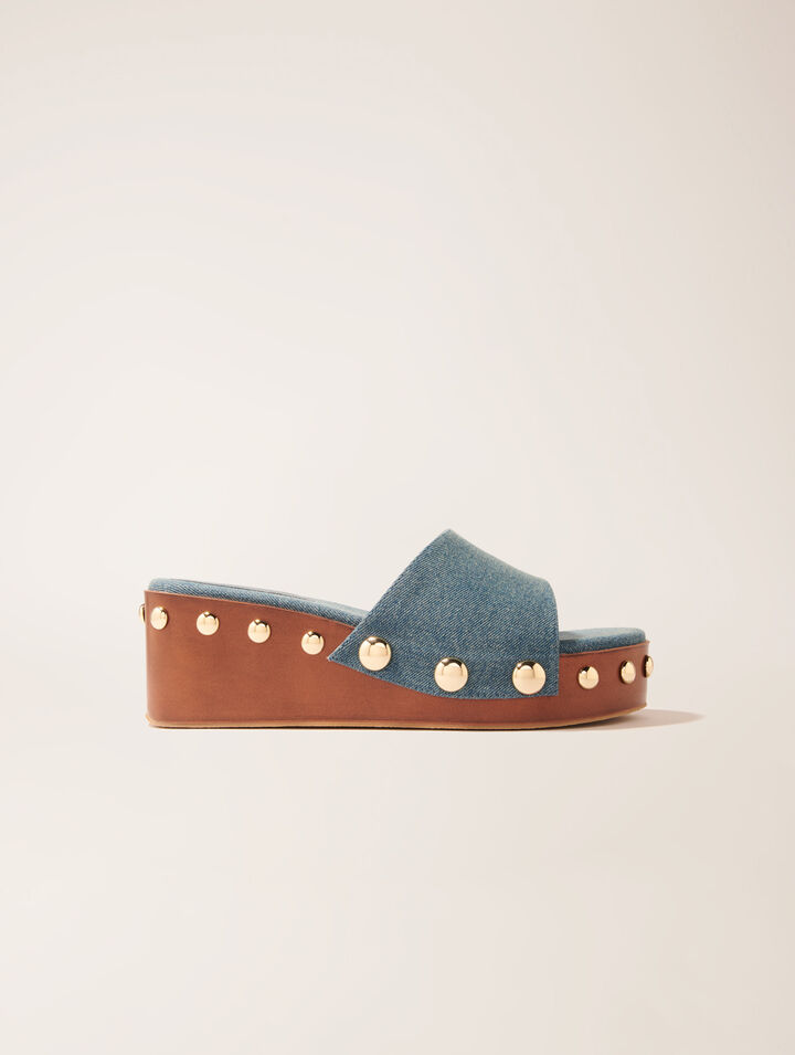 Mules compensées en denim à studs