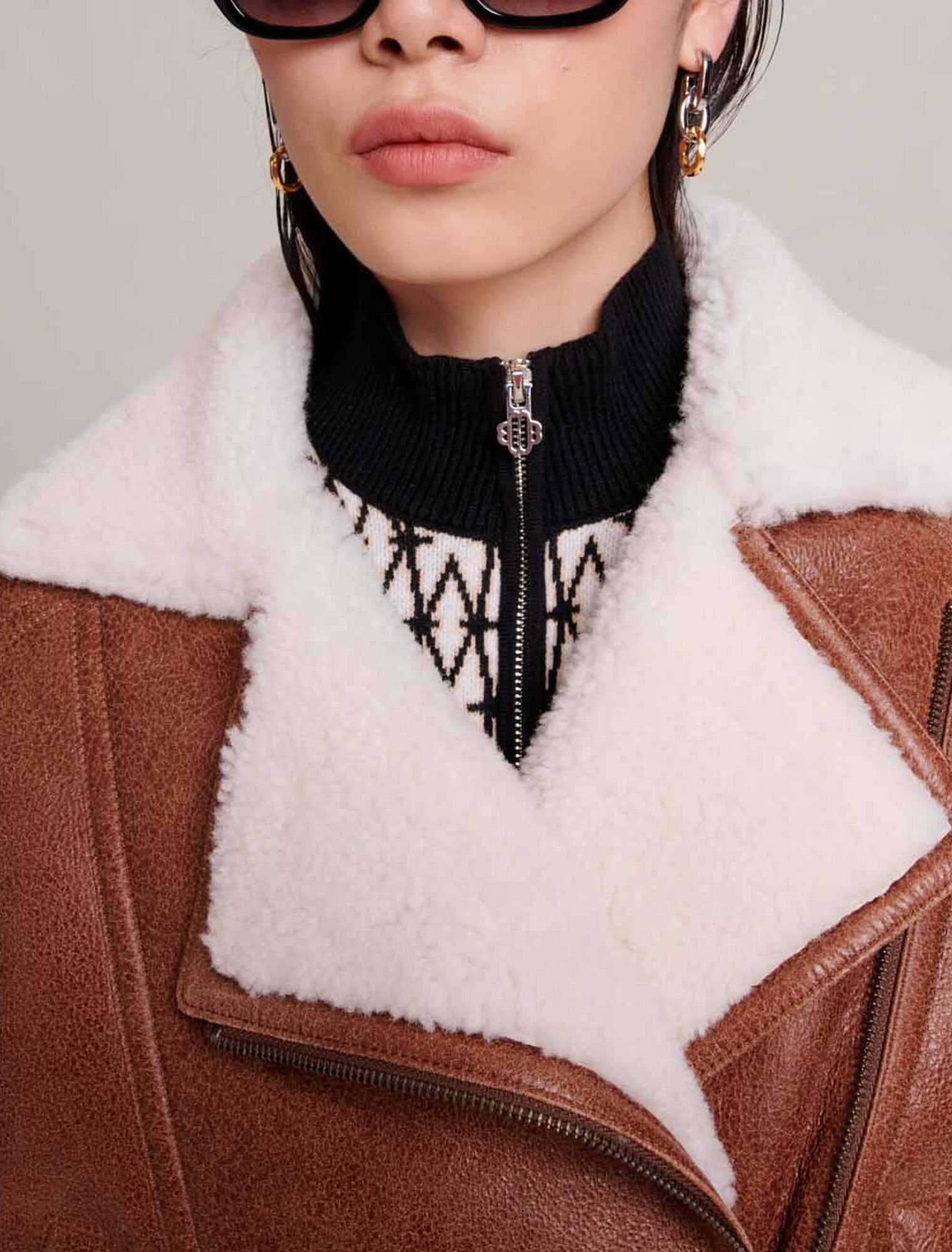 Blouson en cuir et fausse fourrure
