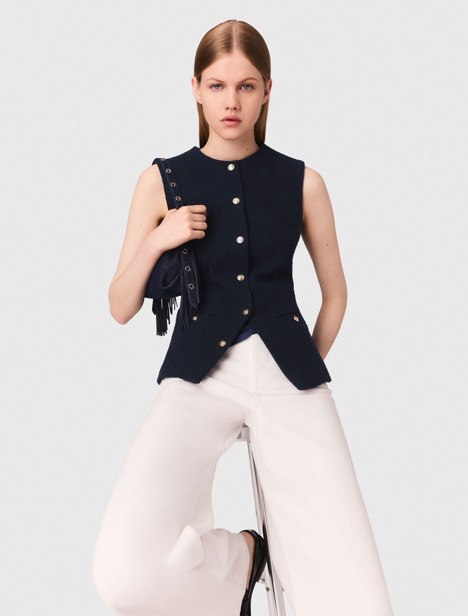 Sleeveless tweed jacket