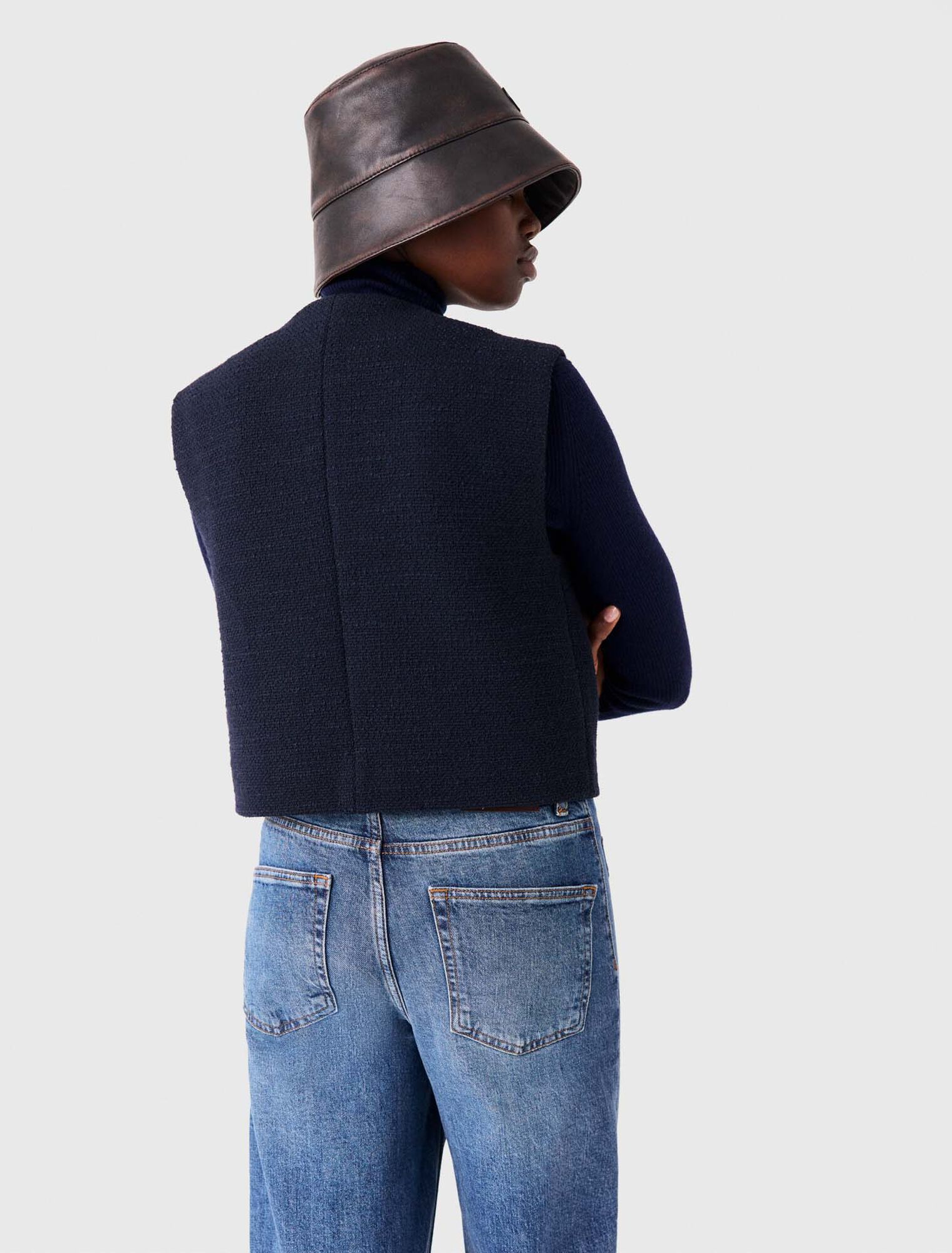 Sleeveless tweed jacket