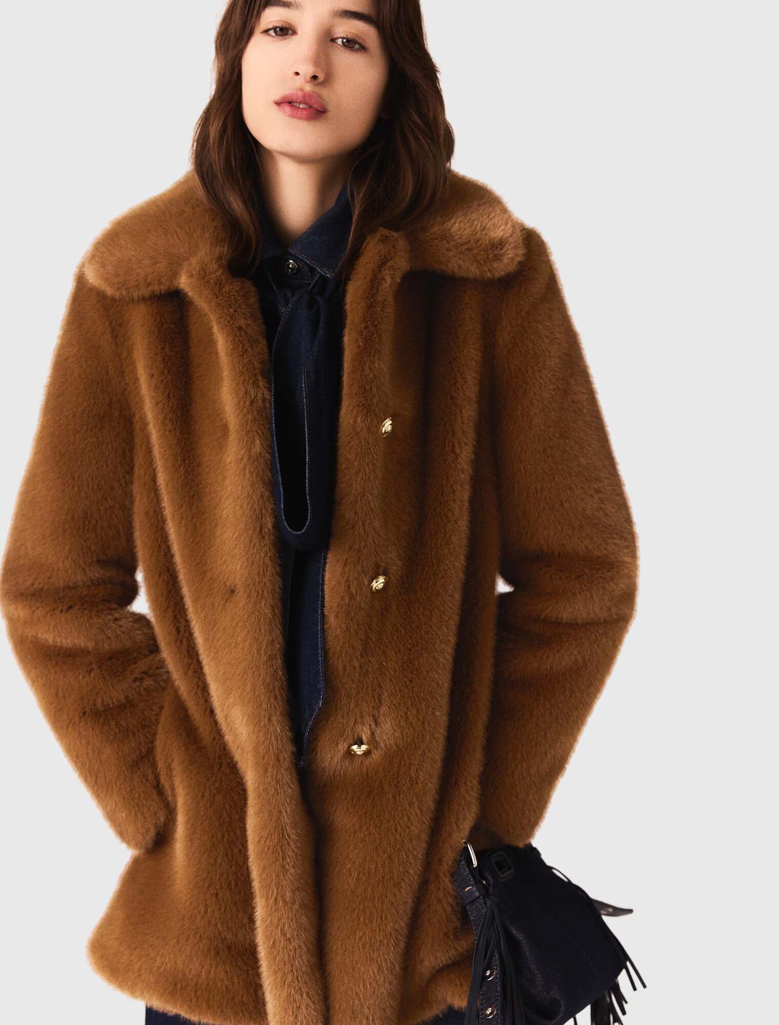 Manteau mi-long en fausse fourrure Manteau mi-long en fausse fourrure