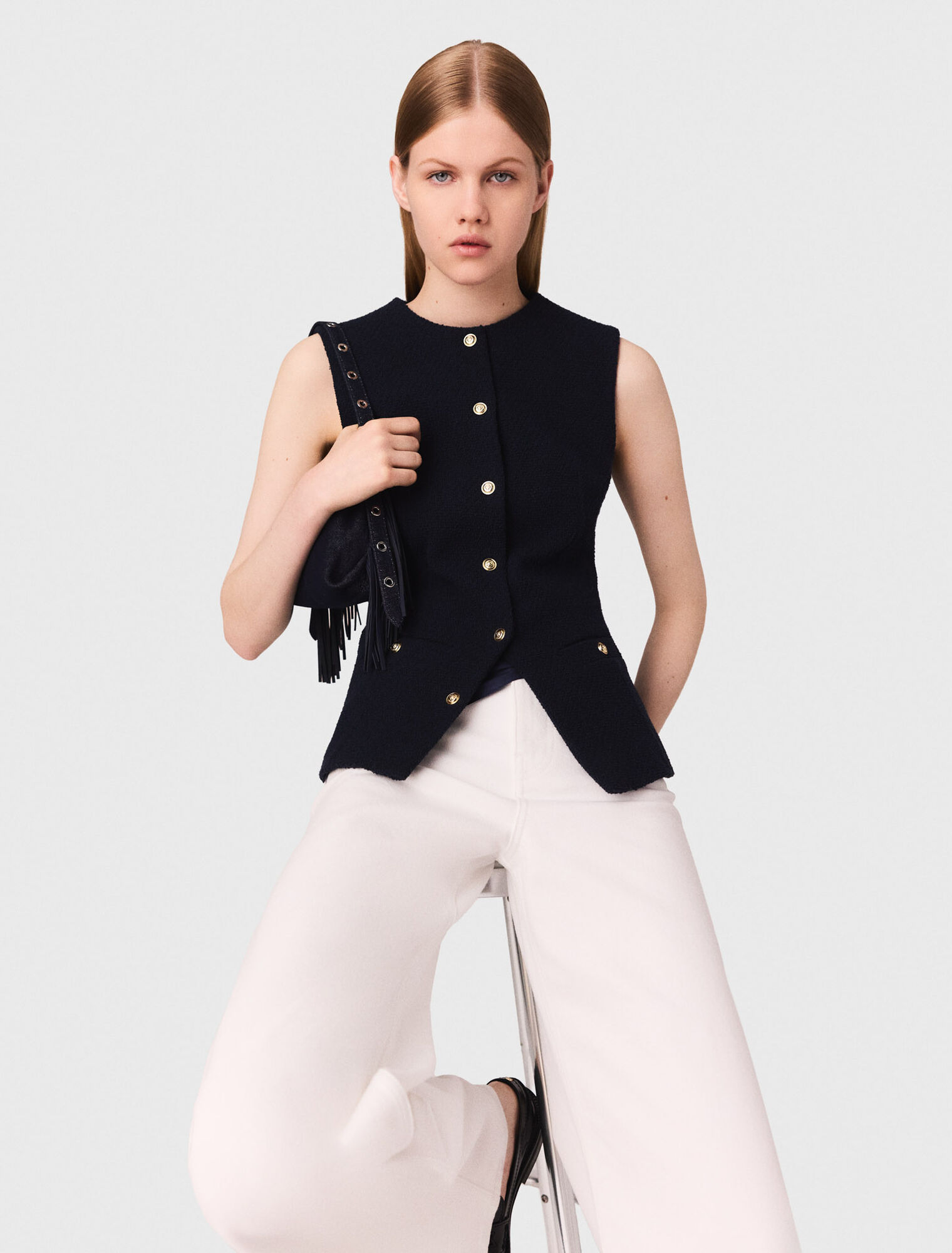 Sleeveless tweed jacket