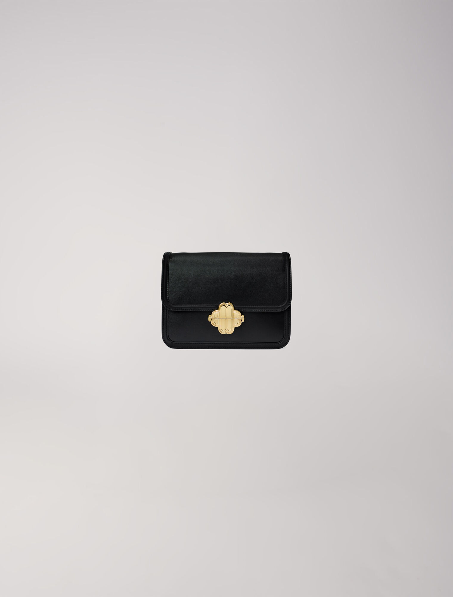 Leather bag with clover clasp