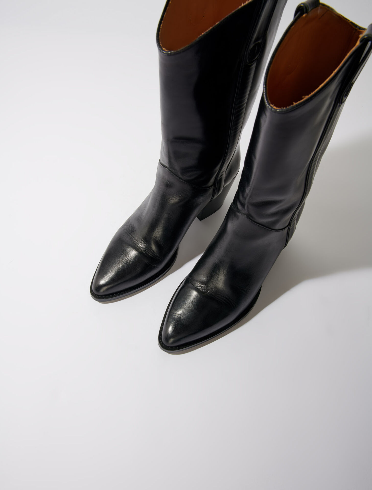 Heeled leather boots