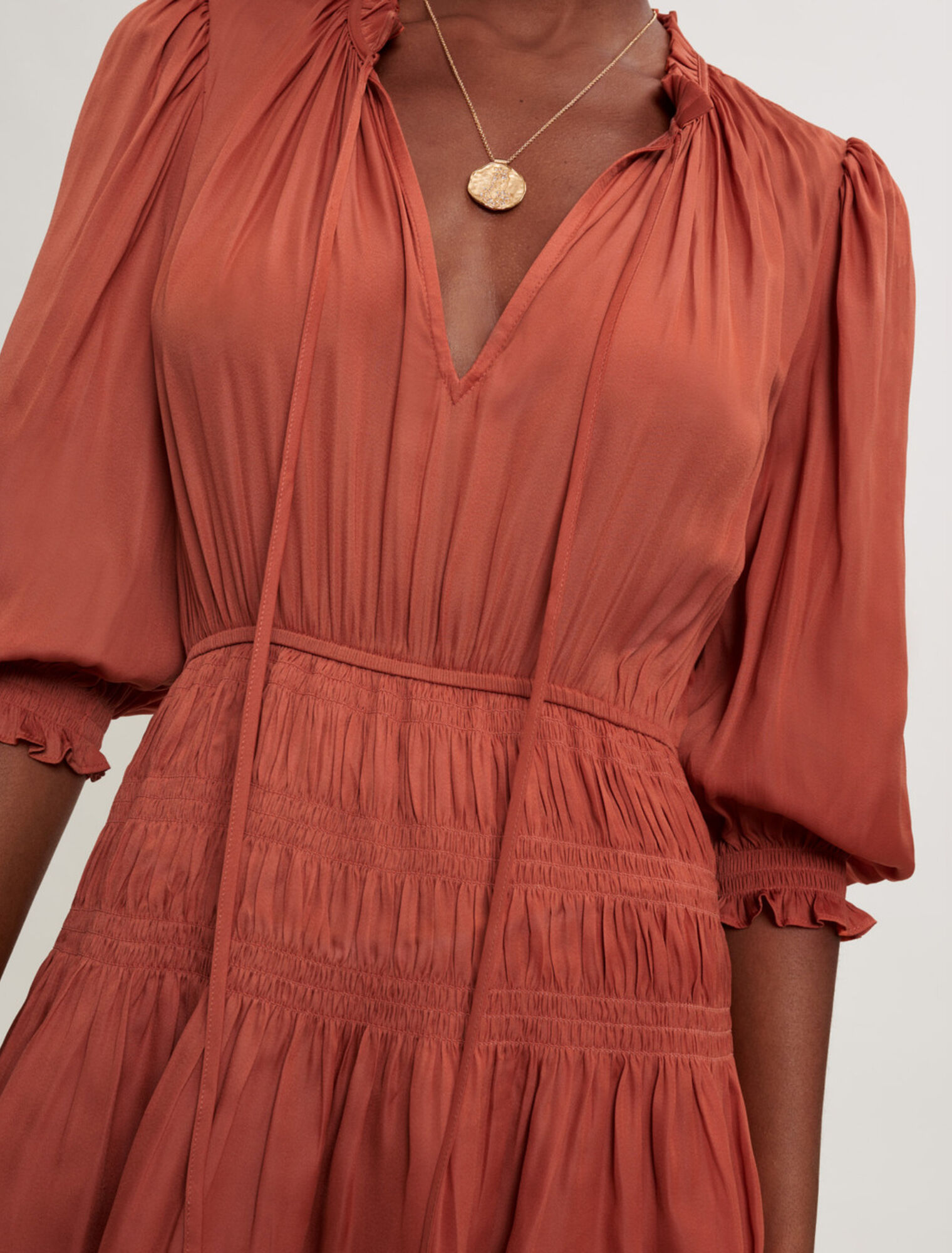 Satin dress with ruffles