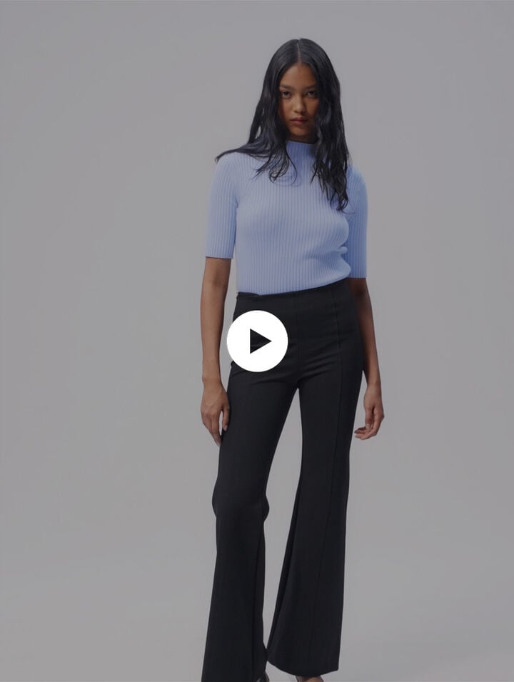 Trousers with jewellery detail