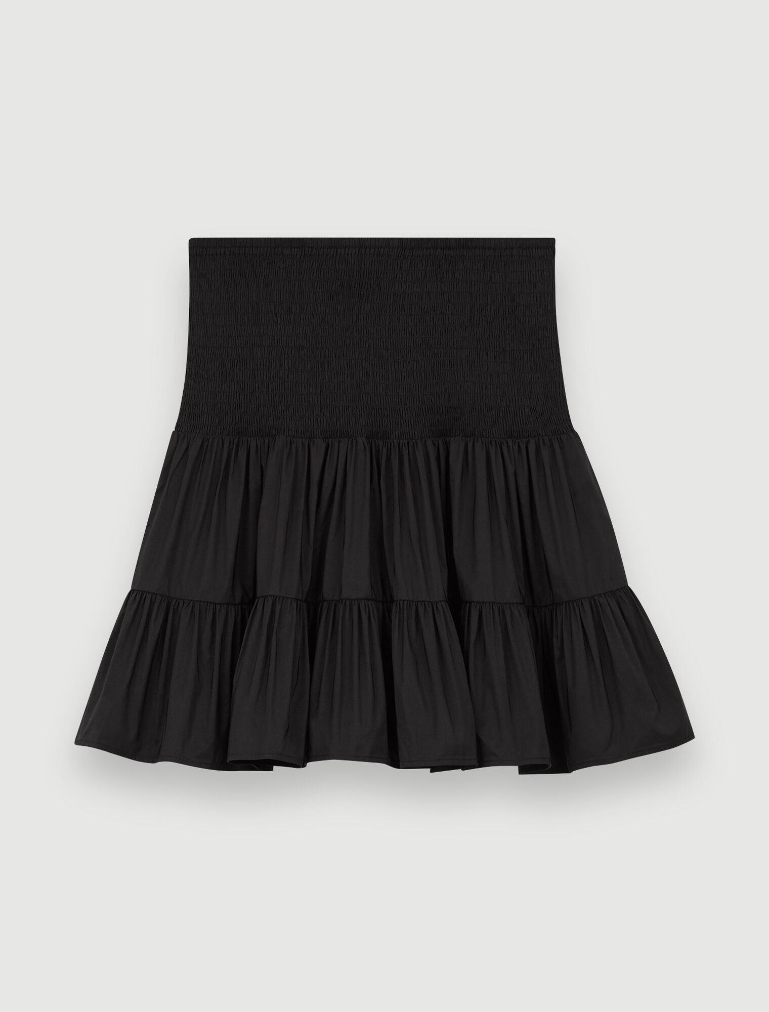 Jupe courte à smocks et volants