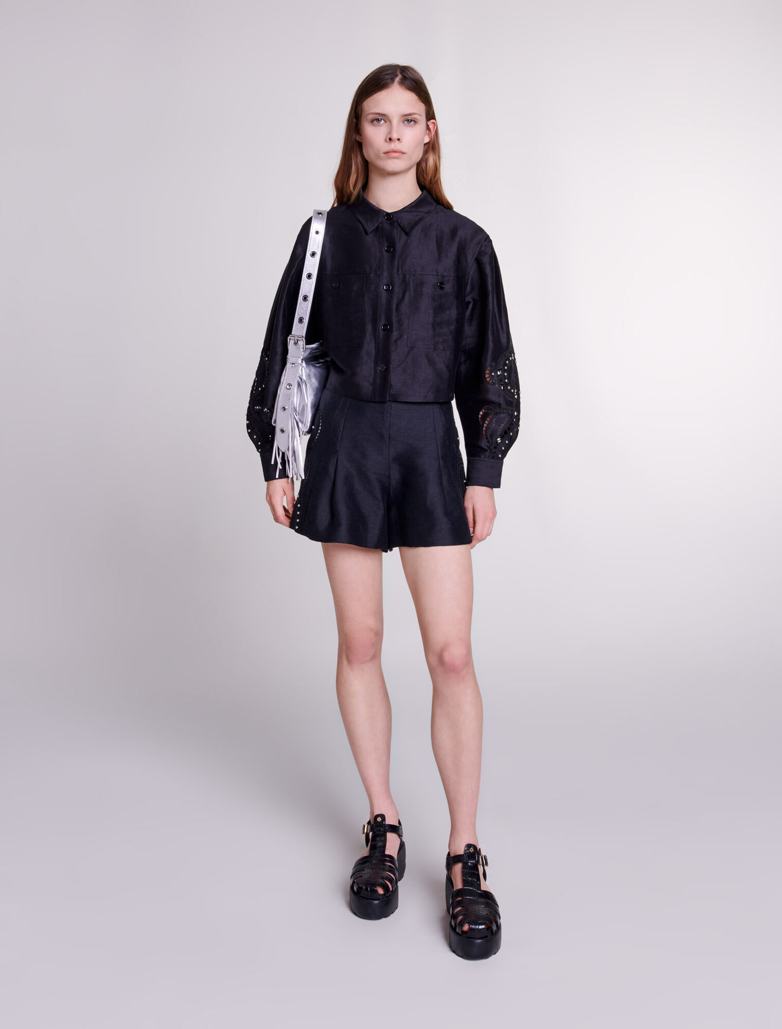 Openwork linen shorts with rivets