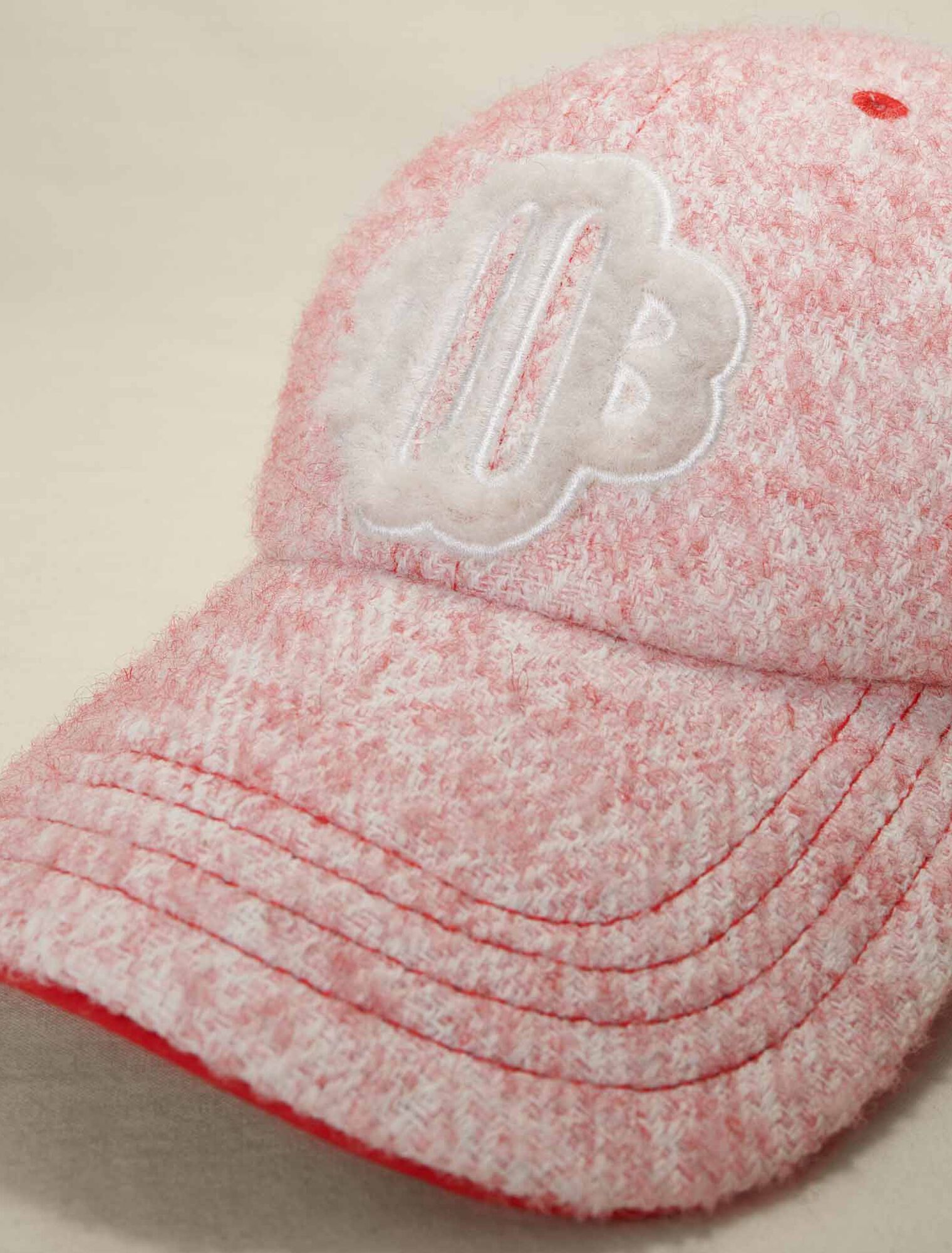 Casquette effet tweed rose