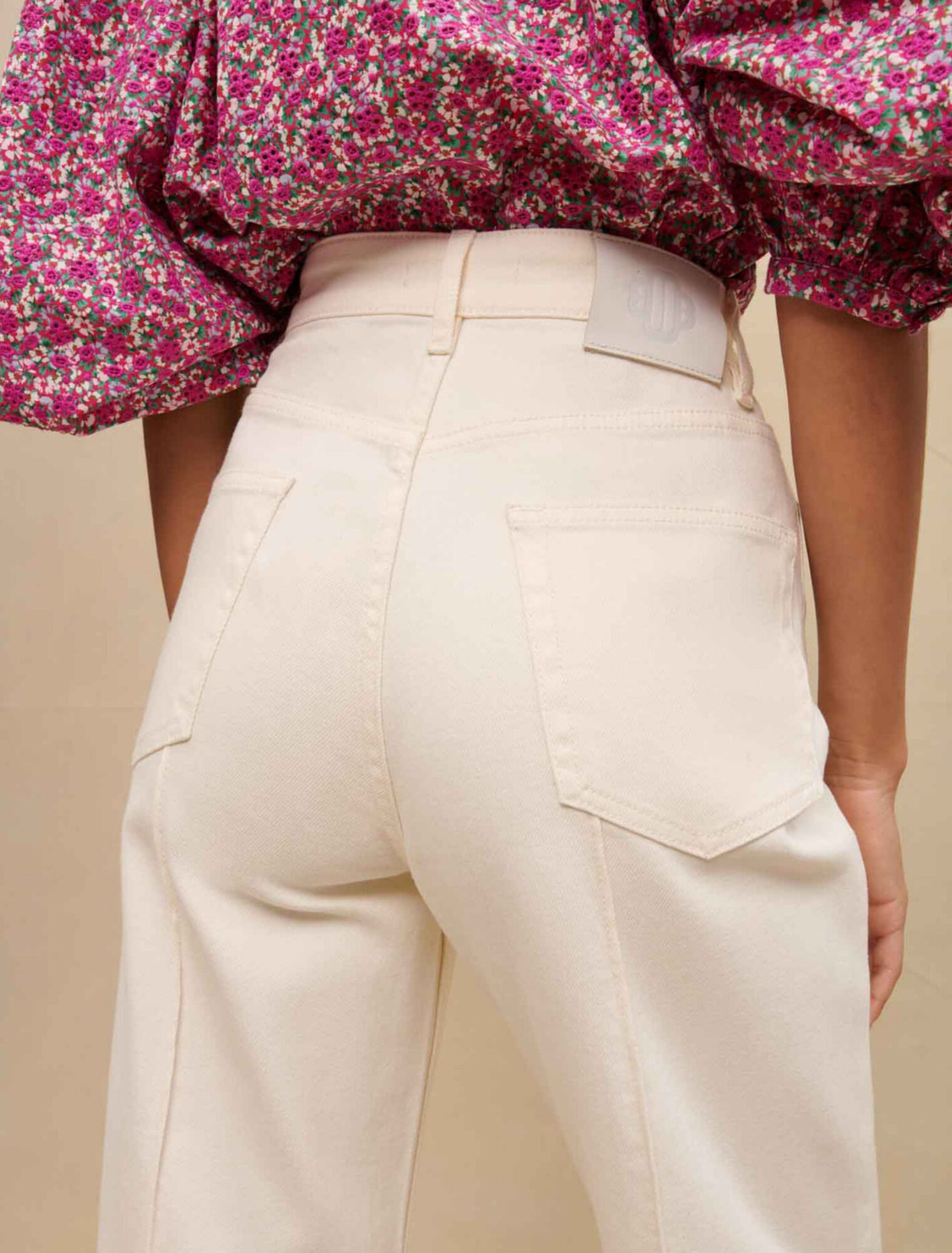 Pantalon large à boutons latéraux