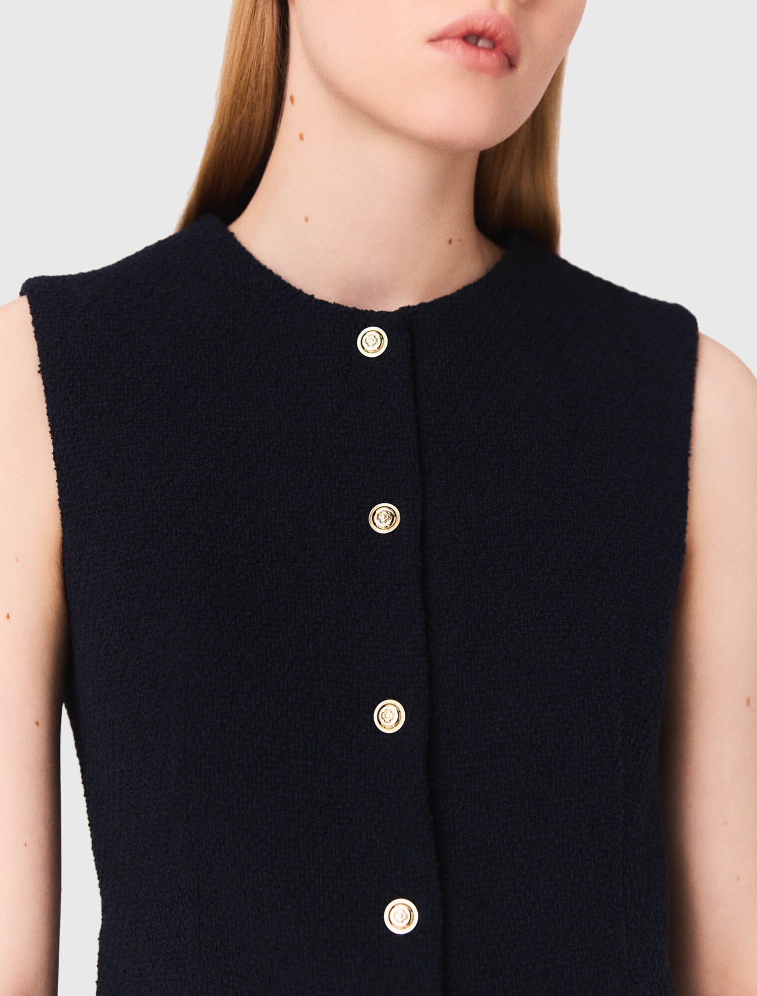 Sleeveless tweed jacket