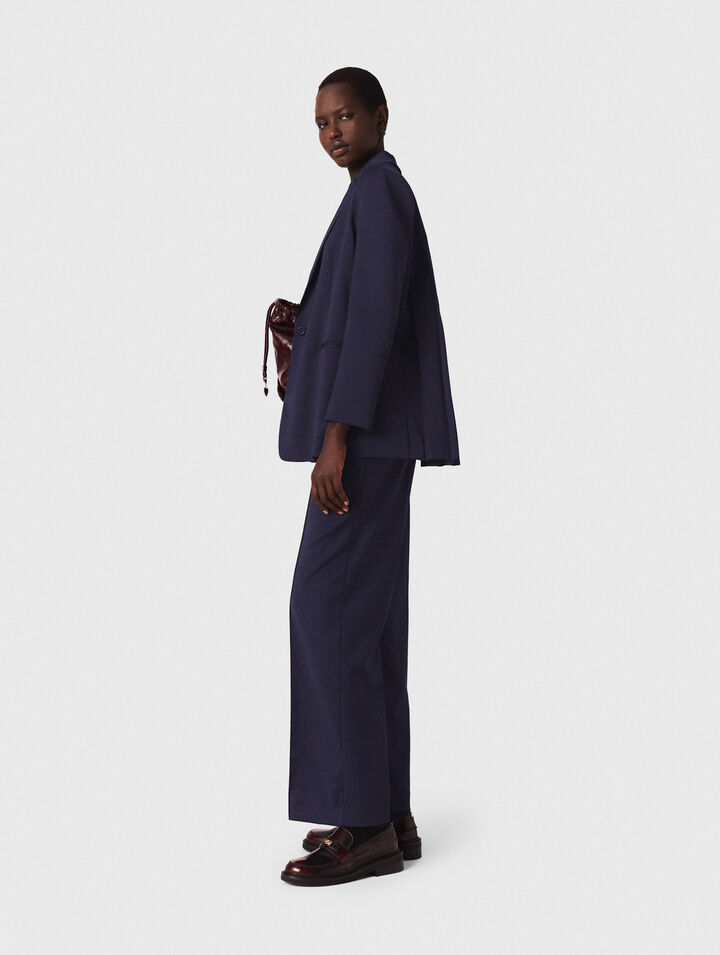 Suit jacket with pleated back