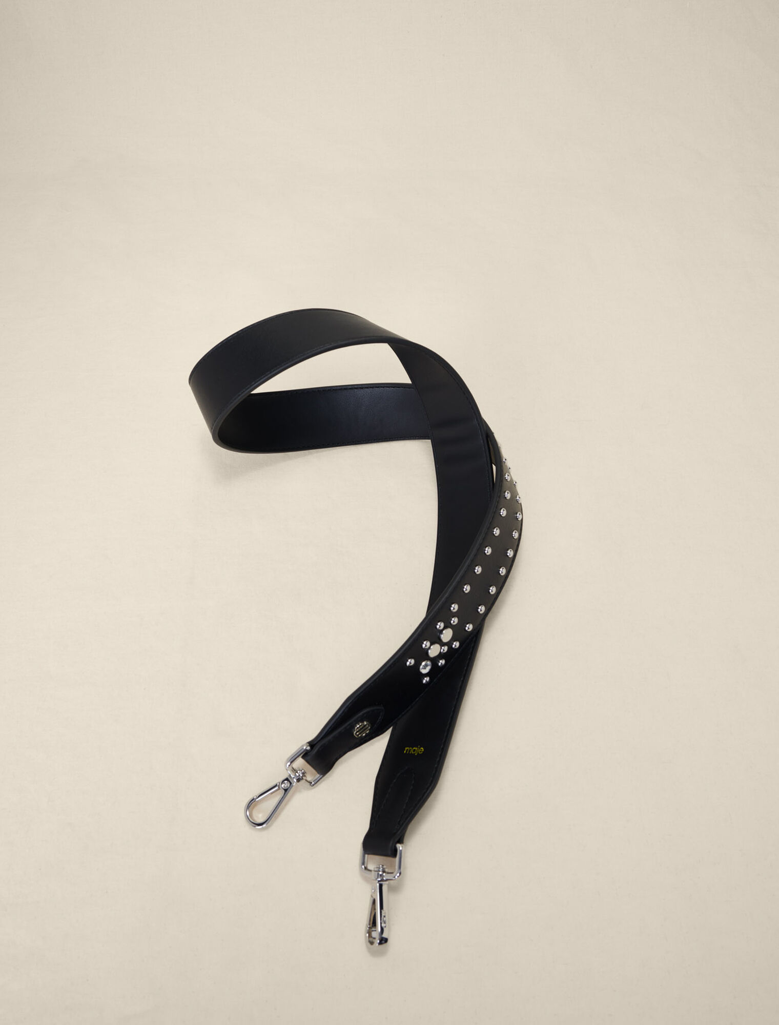 Studded leather shoulder strap