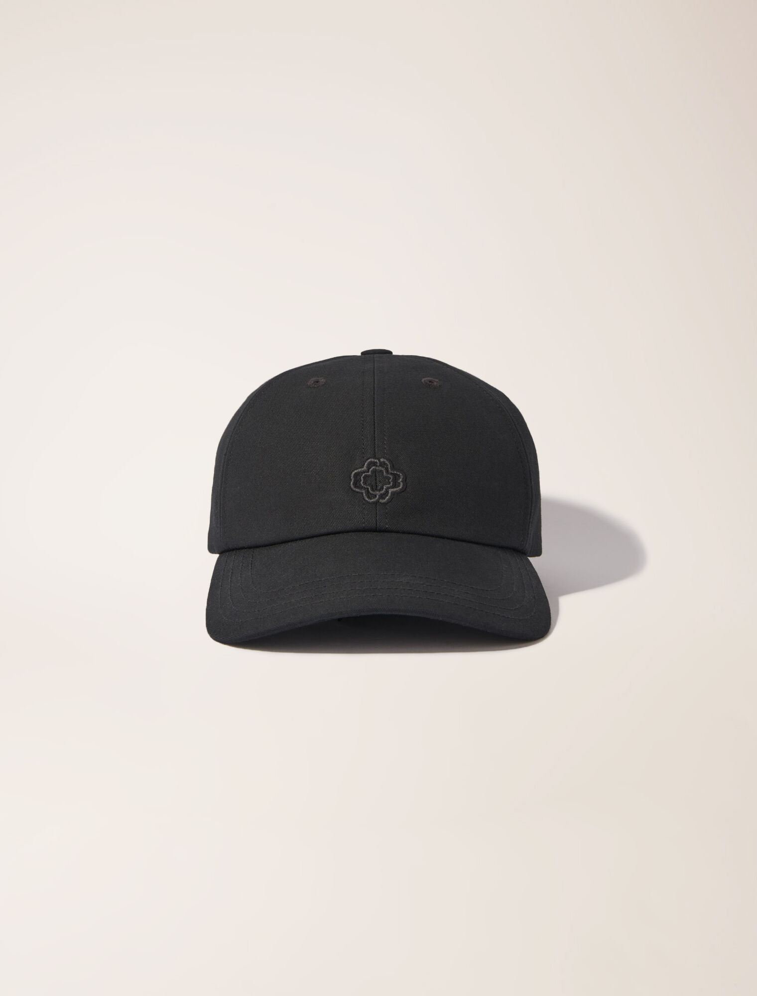 Cotton cap with gold-tone buckle
