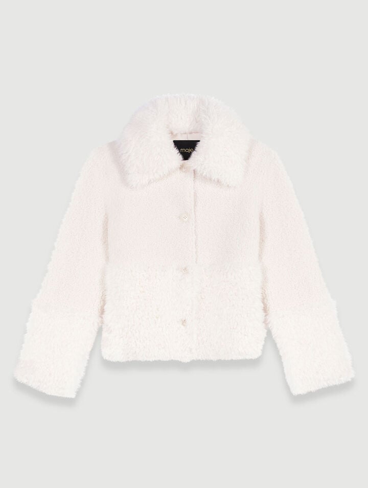 Manteau court fausse fourrure