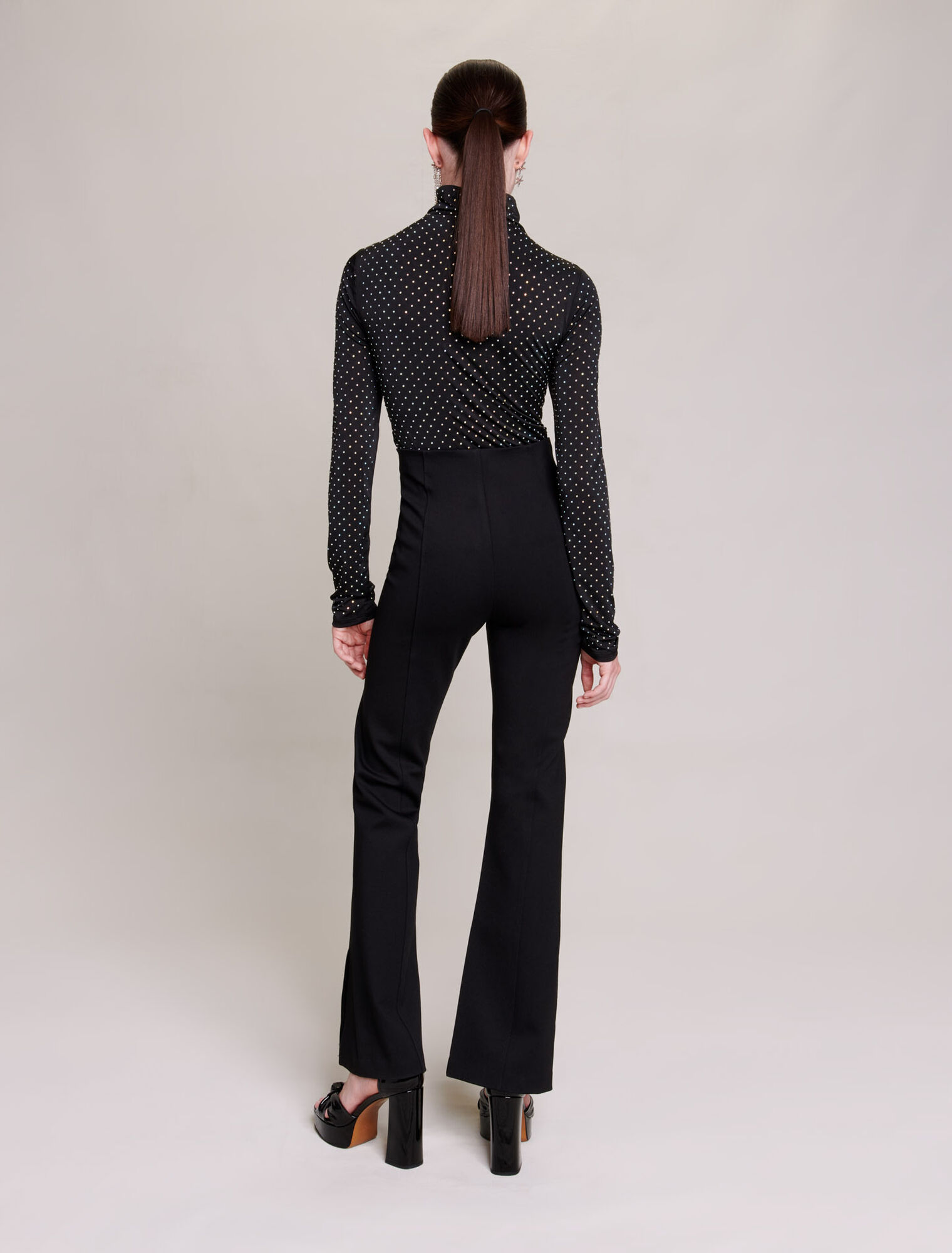 Black slim-fit trousers with slits