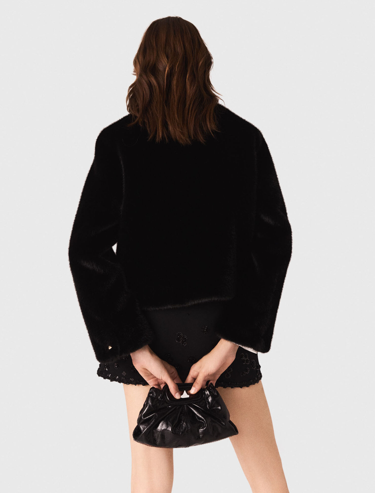 Manteau court en fausse fourrure