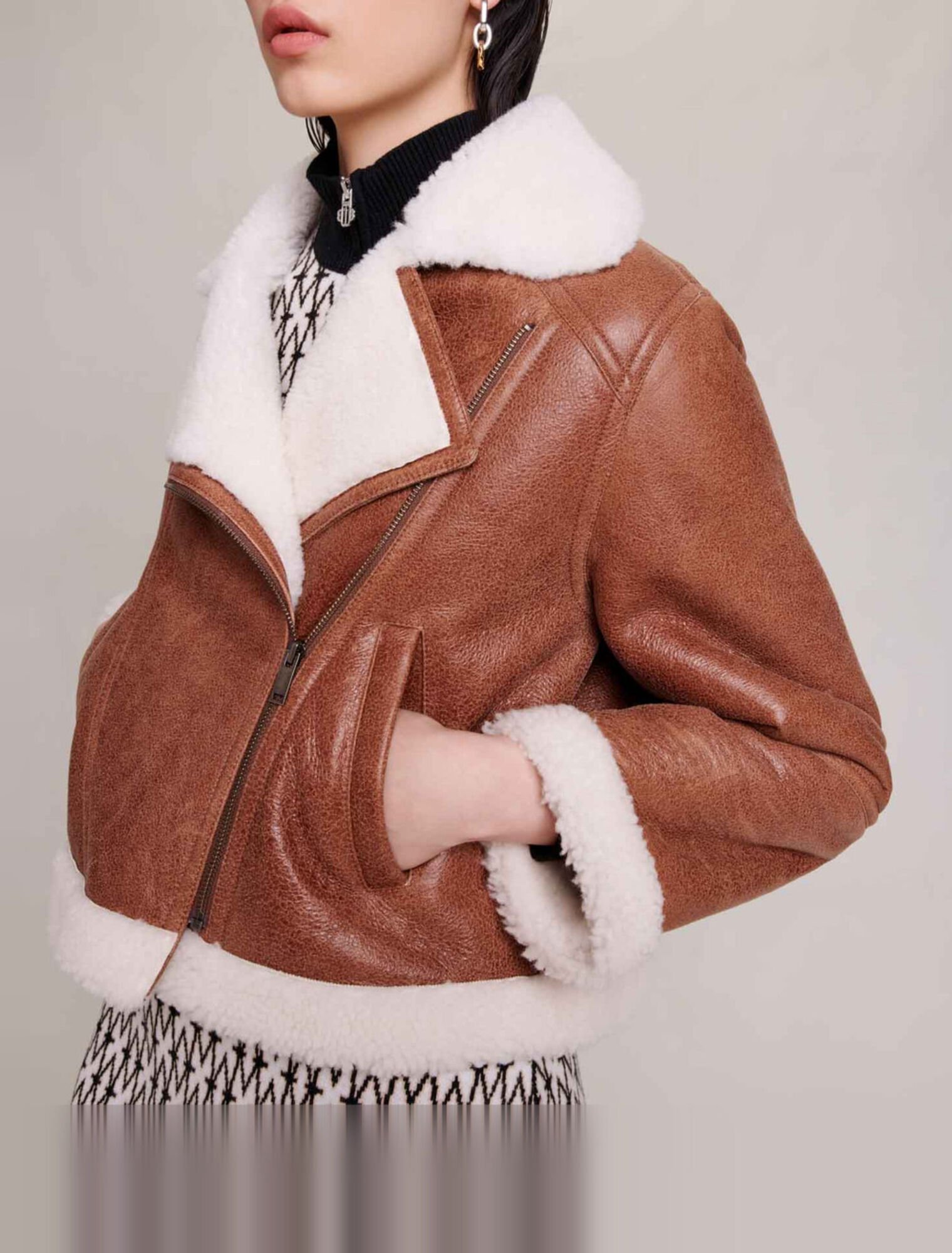 Blouson en cuir et fausse fourrure