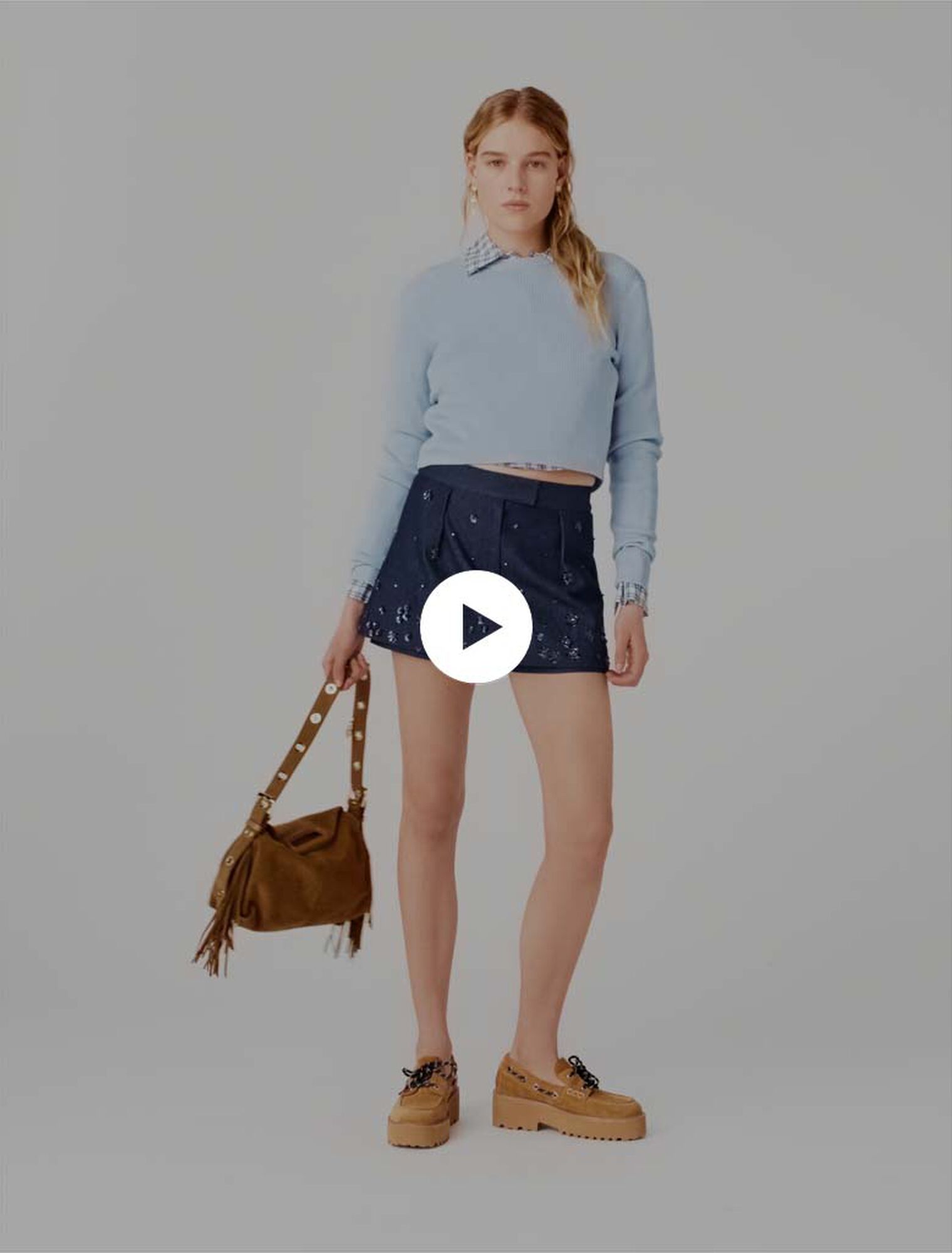 Sweater with jewelled buttons