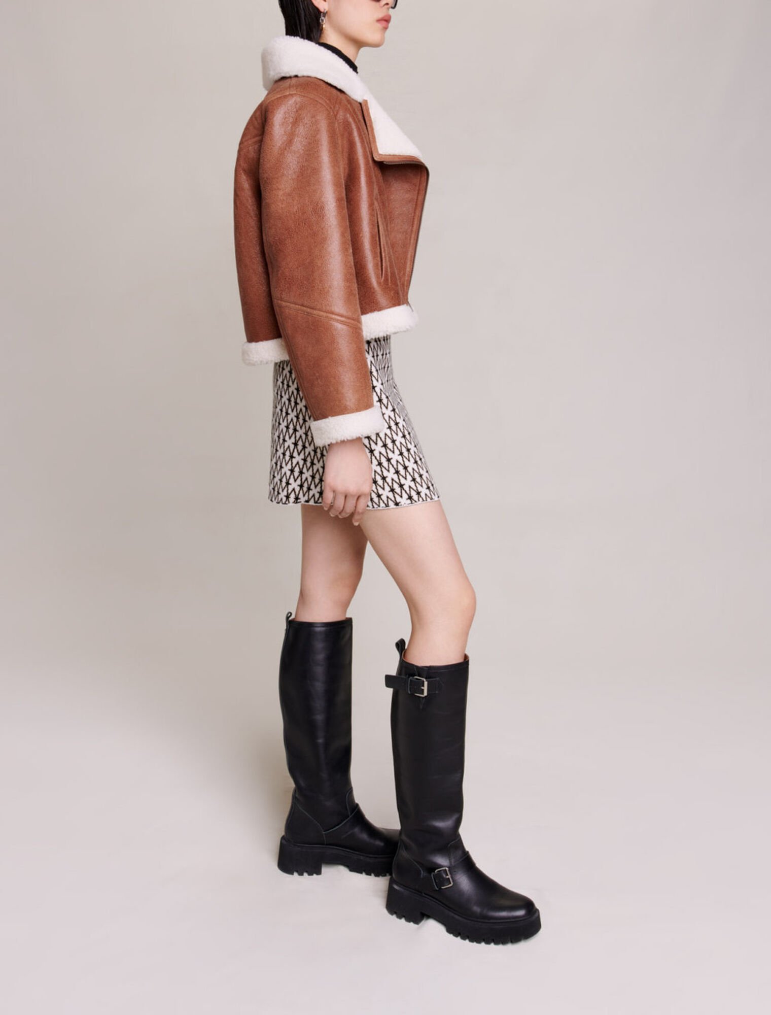 Blouson en cuir et fausse fourrure