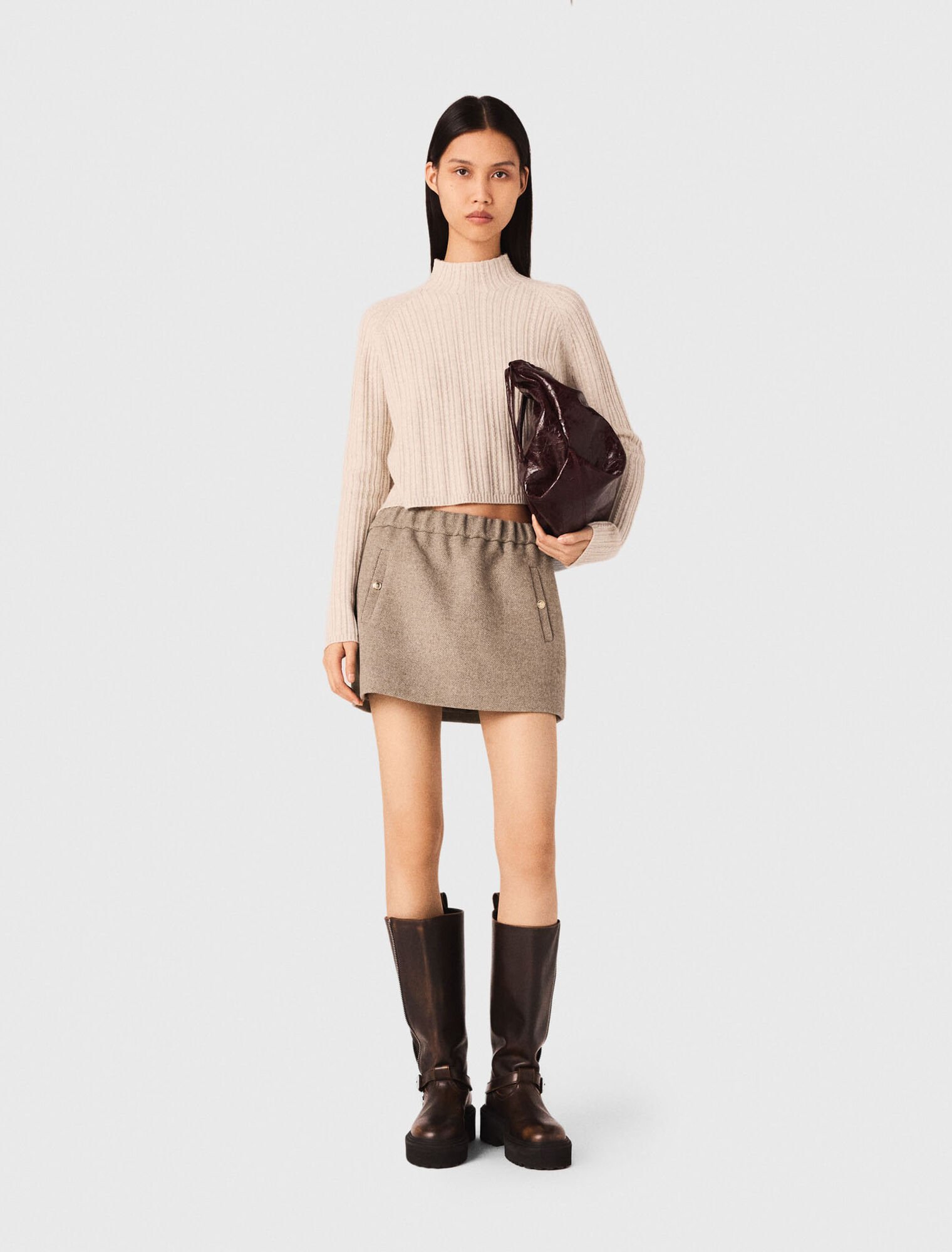 Pull court en maille torsadée