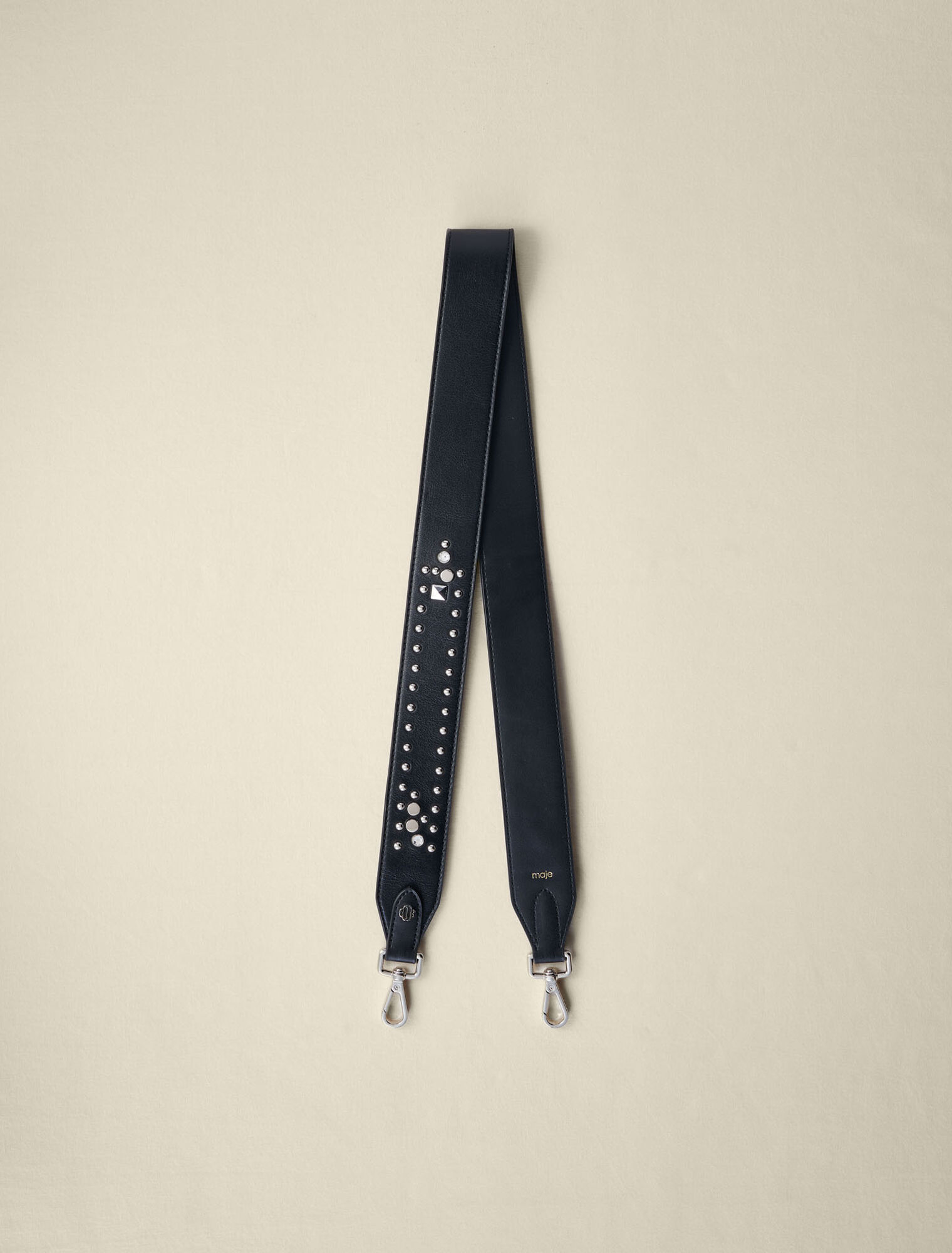 Studded leather shoulder strap
