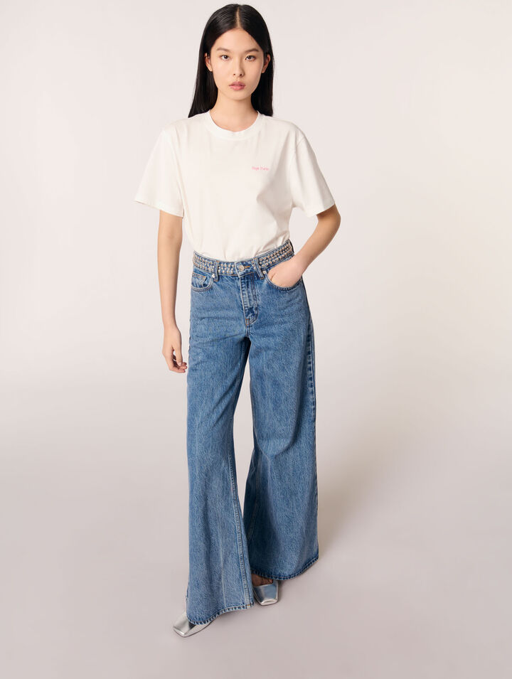 Flared jeans with studded waistband