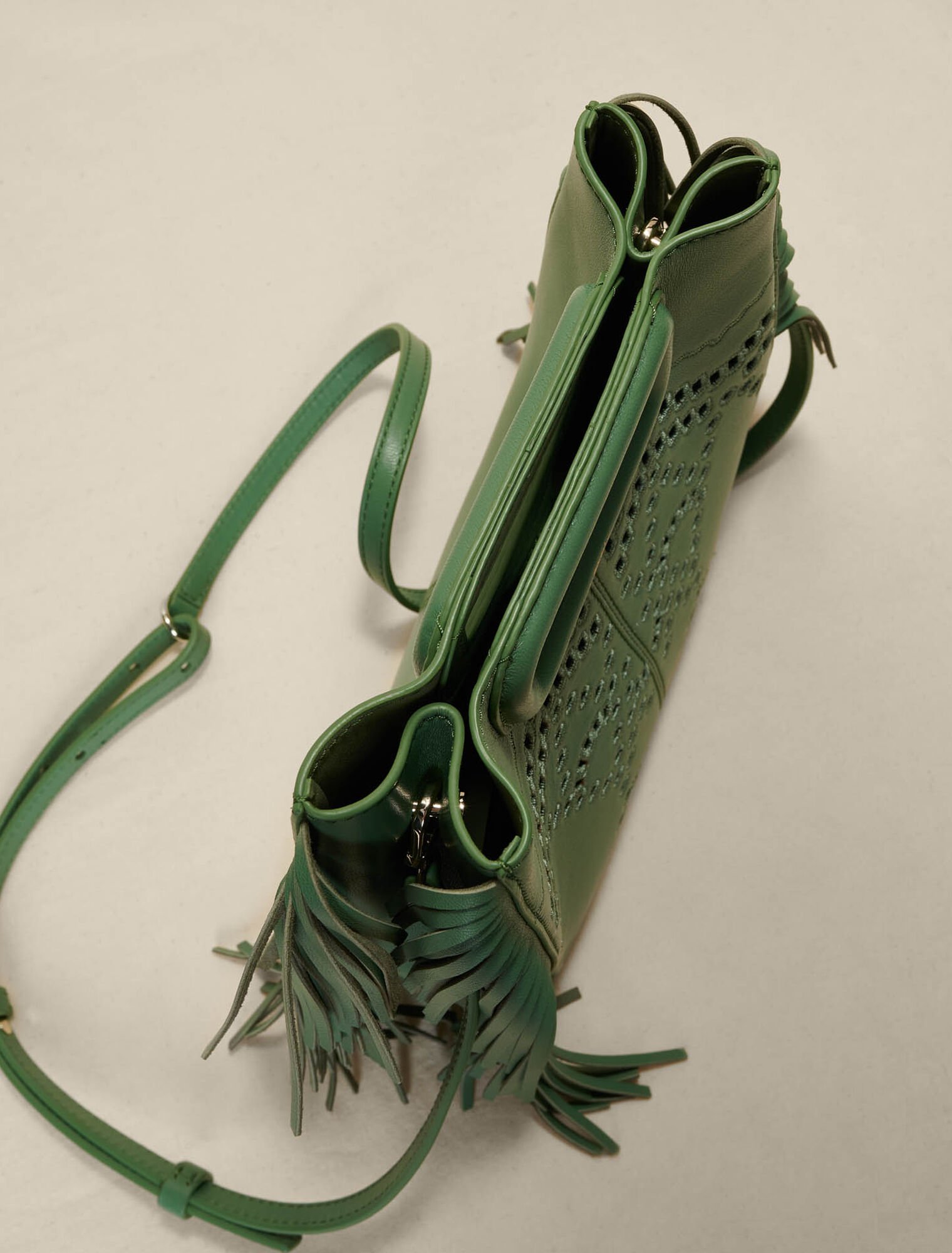 Perforated, fringed leather M bag