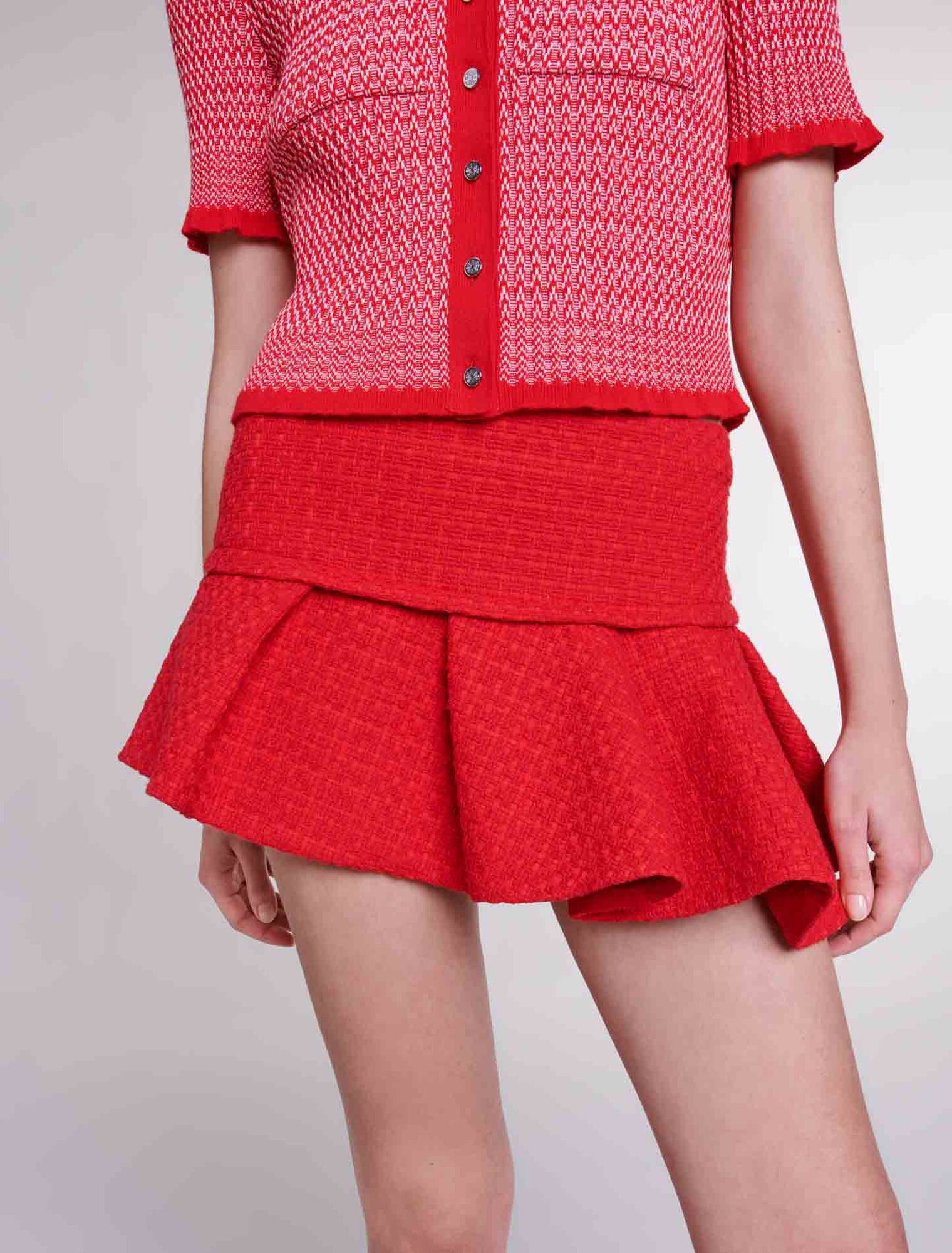 Mini-jupe en tweed asymétrique