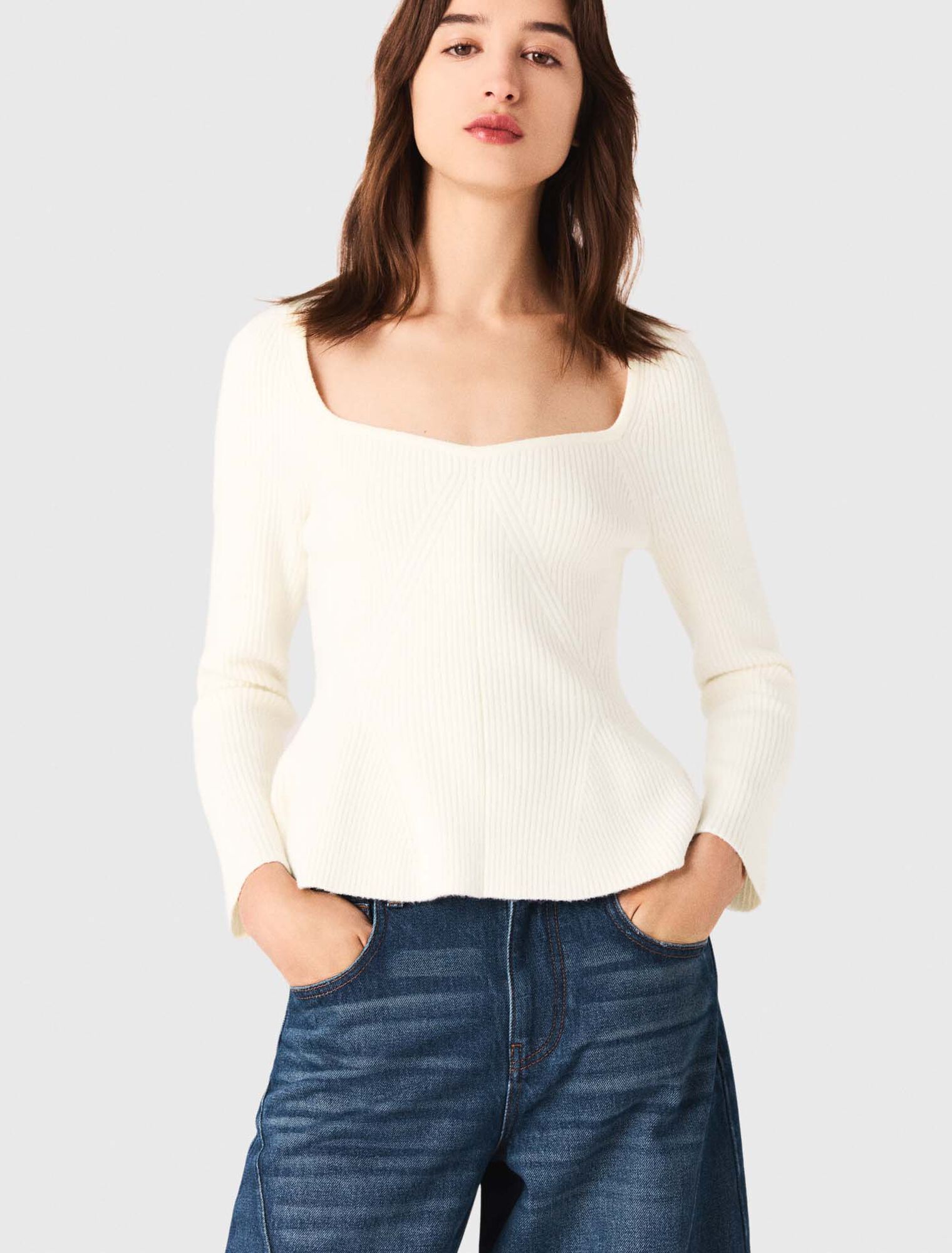 Pull en maille à taille péplum