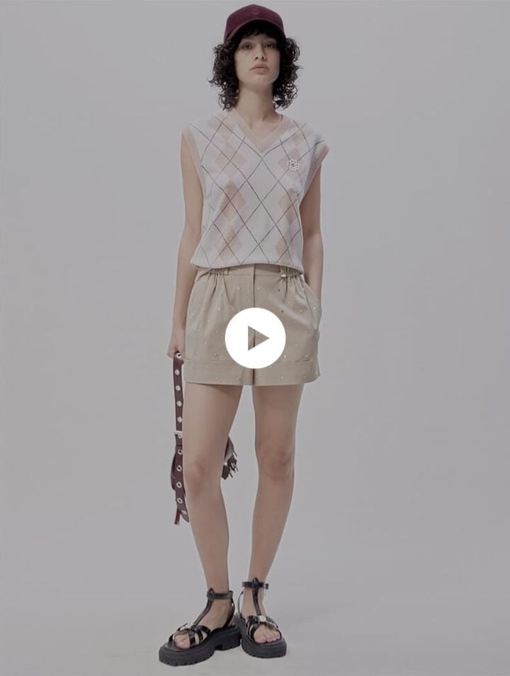 Pull sans manches en laine m&eacute;lang&eacute;e