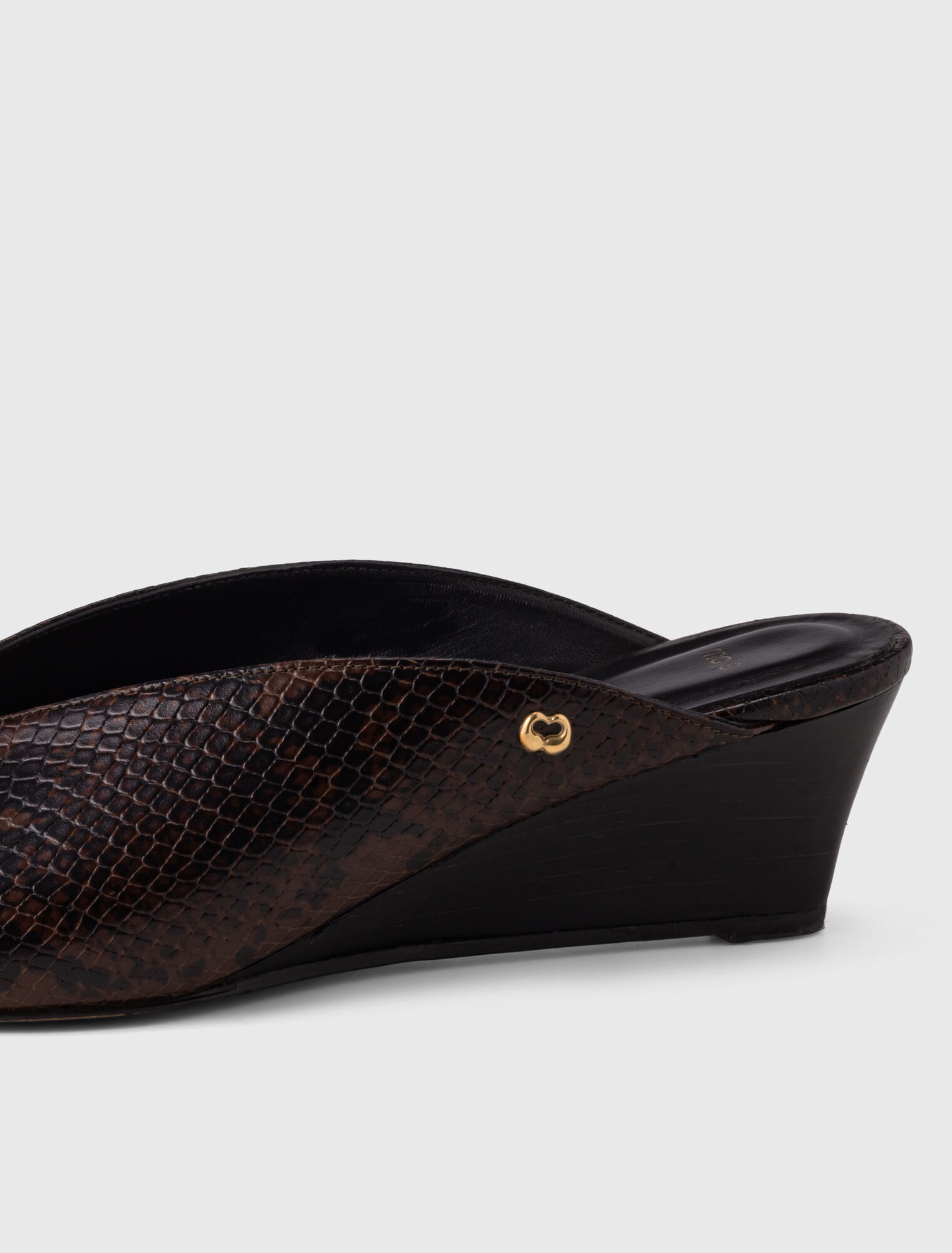 Embossed leather wedge mules