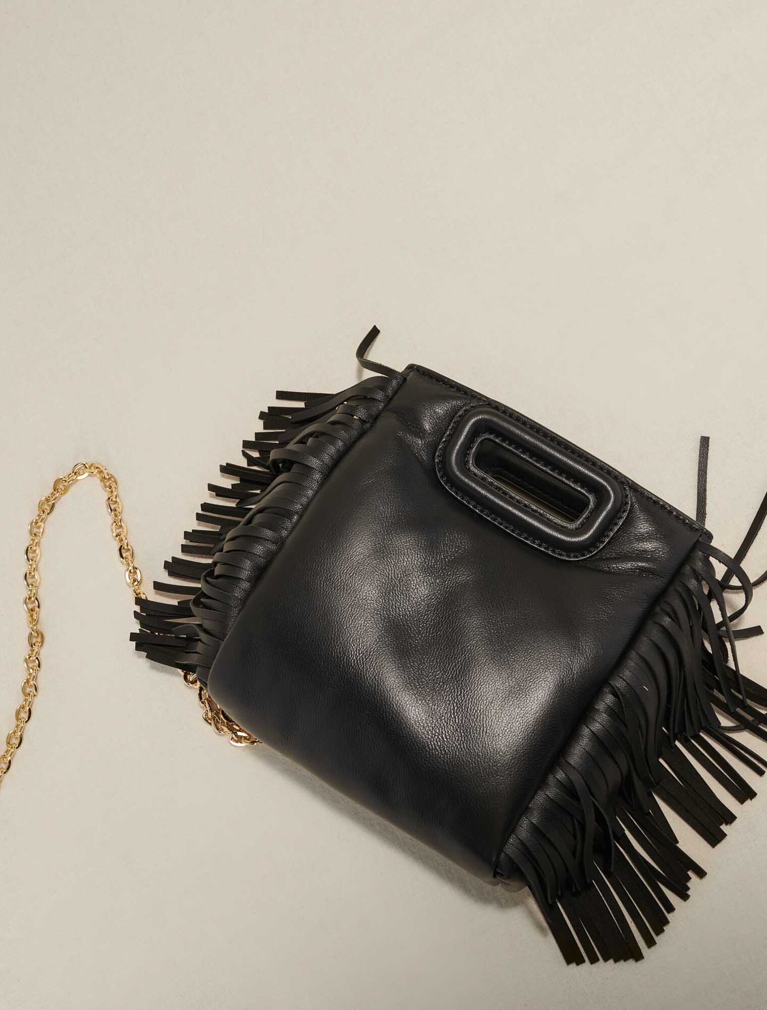Sac M en cuir matelassé à studs
